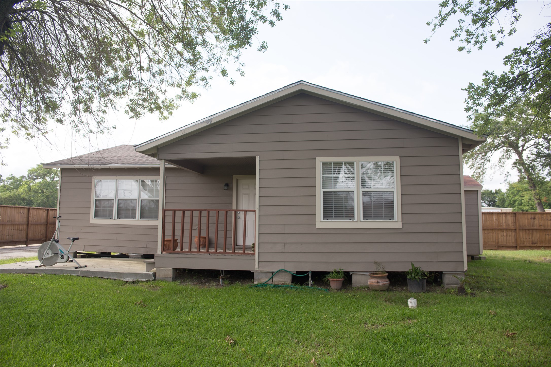16947 Avenue A Channelview, TX 77530 - Photo 2 of 12 a backyard of a house with table and chairs