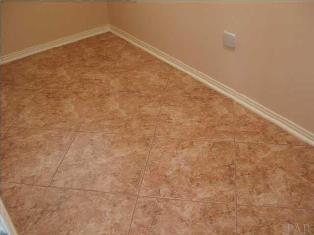 151 Dean Road Pensacola, FL 32503 - Photo 14 of 23 ~ Diamond Shaped NEW 18" Tile in the Kitchen, the Eat - IN Area plus the IN - Side Laundry Room ~