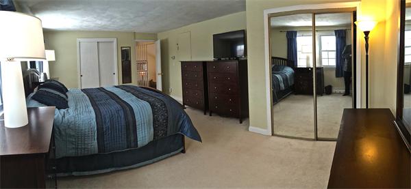 7 Lexington Road Billerica, MA 01821 - Photo 11 of 20 a spacious bedroom with a bed and a walk in closet