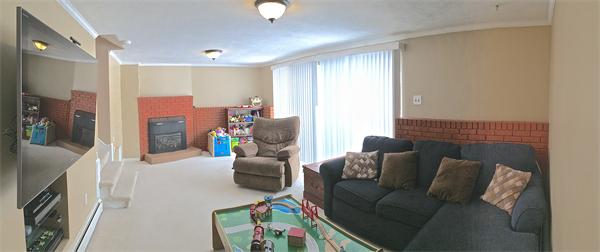 7 Lexington Road Billerica, MA 01821 - Photo 14 of 20 a living room with furniture and a flat screen tv