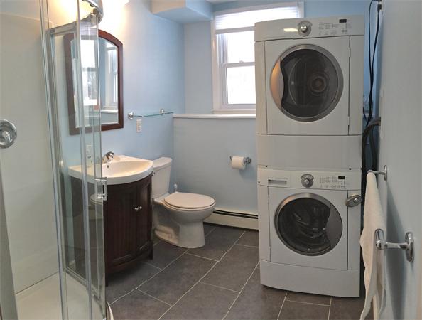 7 Lexington Road Billerica, MA 01821 - Photo 18 of 20 a utility room with dryer washer and a sink