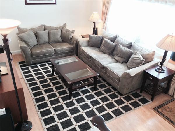 7 Lexington Road Billerica, MA 01821 - Photo 4 of 20 a living room with a black white checkered floor with a black white checkered floor
