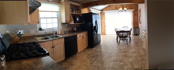 7 Lexington Road Billerica, MA 01821 - Photo 8 of 20 a kitchen with a sink a stove a refrigerator and furniture