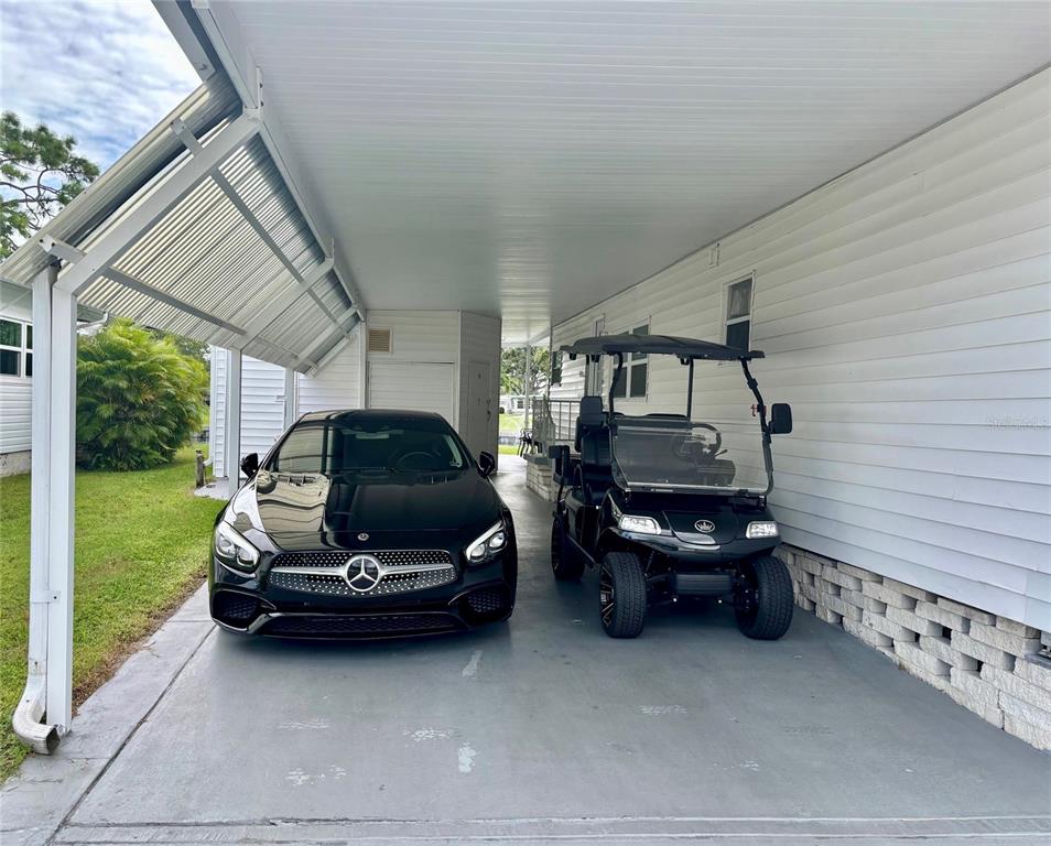 1100 South Belcher Road, Unit 454 Largo, FL 33771 - Photo 2 of 61 a car parked in front of a house