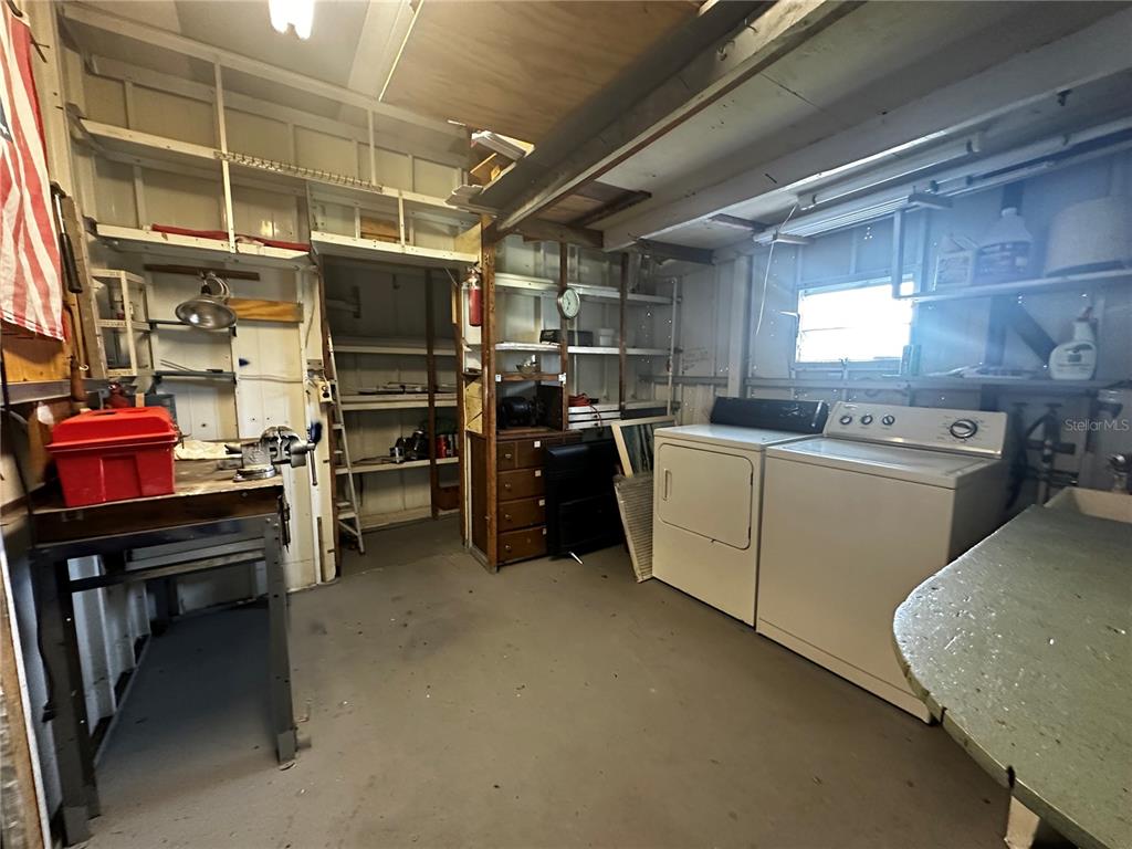 1100 South Belcher Road, Unit 454 Largo, FL 33771 - Photo 29 of 61 a utility room with cabinets dryer and washer
