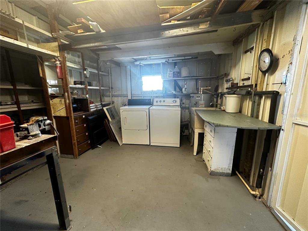 1100 South Belcher Road, Unit 454 Largo, FL 33771 - Photo 30 of 61 a view of storage and utility room with racks a window