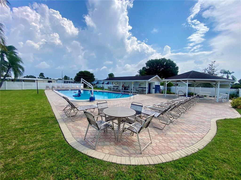 1100 South Belcher Road, Unit 454 Largo, FL 33771 - Photo 46 of 61 a view of a swimming pool with a patio