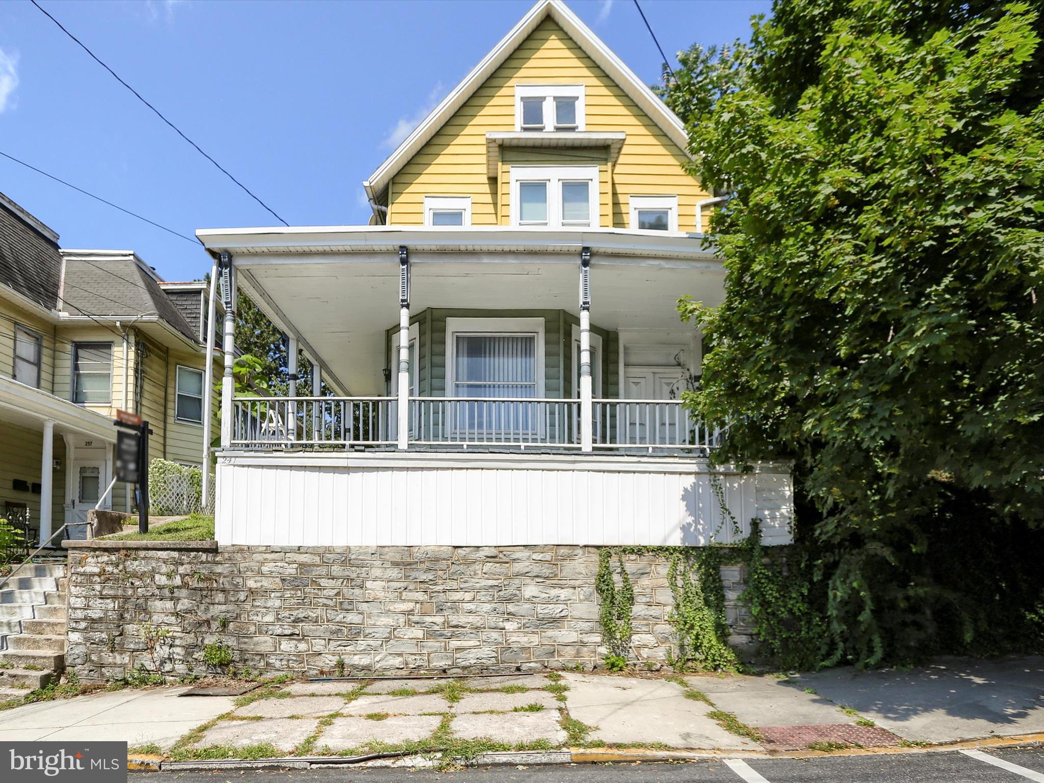 241 Pine Street Steelton, PA 17113 - Photo 1 of 32 a front view of a house with garden