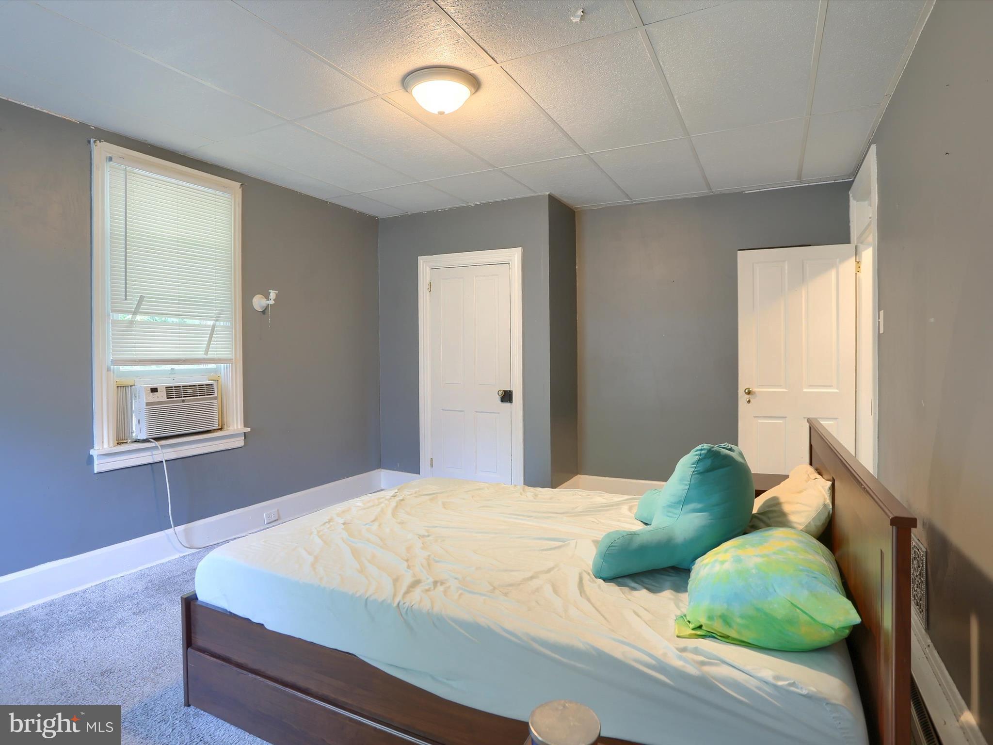 241 Pine Street Steelton, PA 17113 - Photo 17 of 32 a bedroom with a bed and window