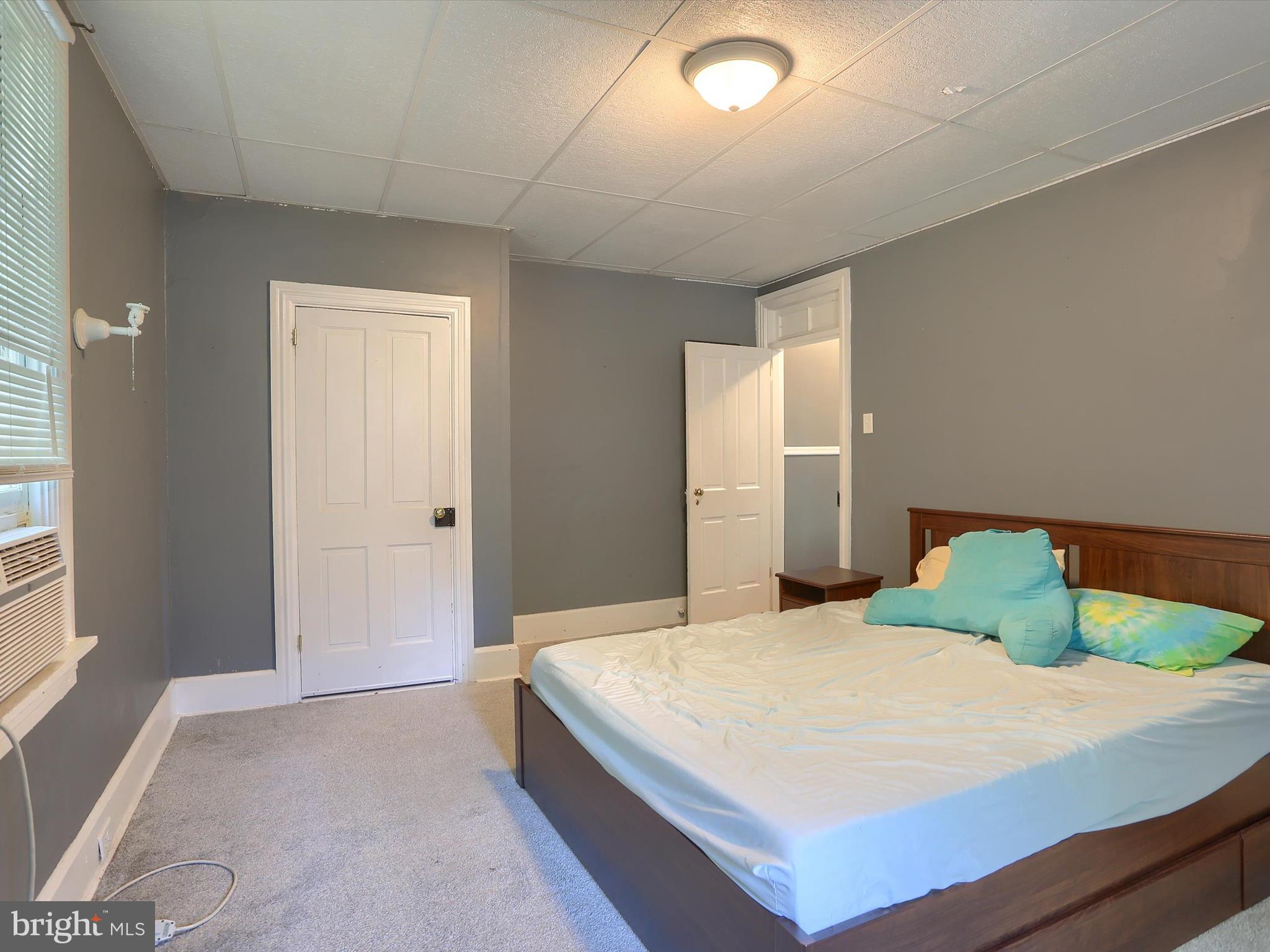 241 Pine Street Steelton, PA 17113 - Photo 18 of 32 a bedroom with a large bed and a large window