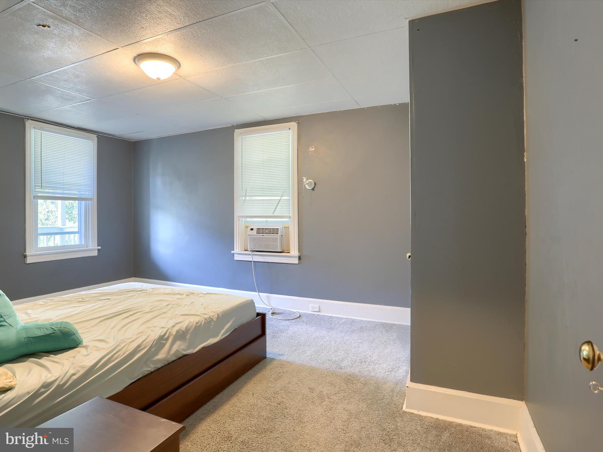 241 Pine Street Steelton, PA 17113 - Photo 19 of 32 a bedroom with a bed and a window