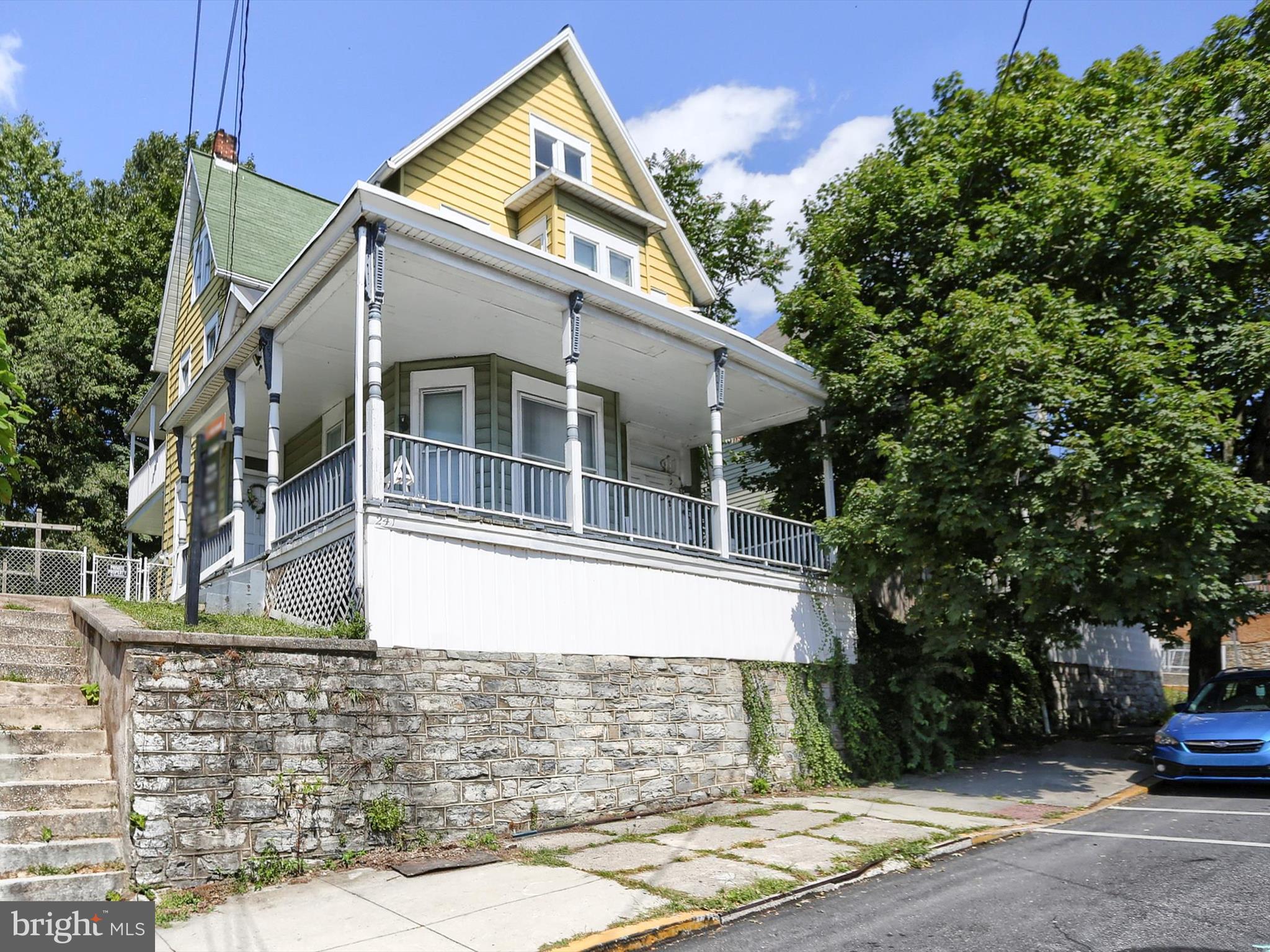 241 Pine Street Steelton, PA 17113 - Photo 2 of 32 a front view of a house with trees