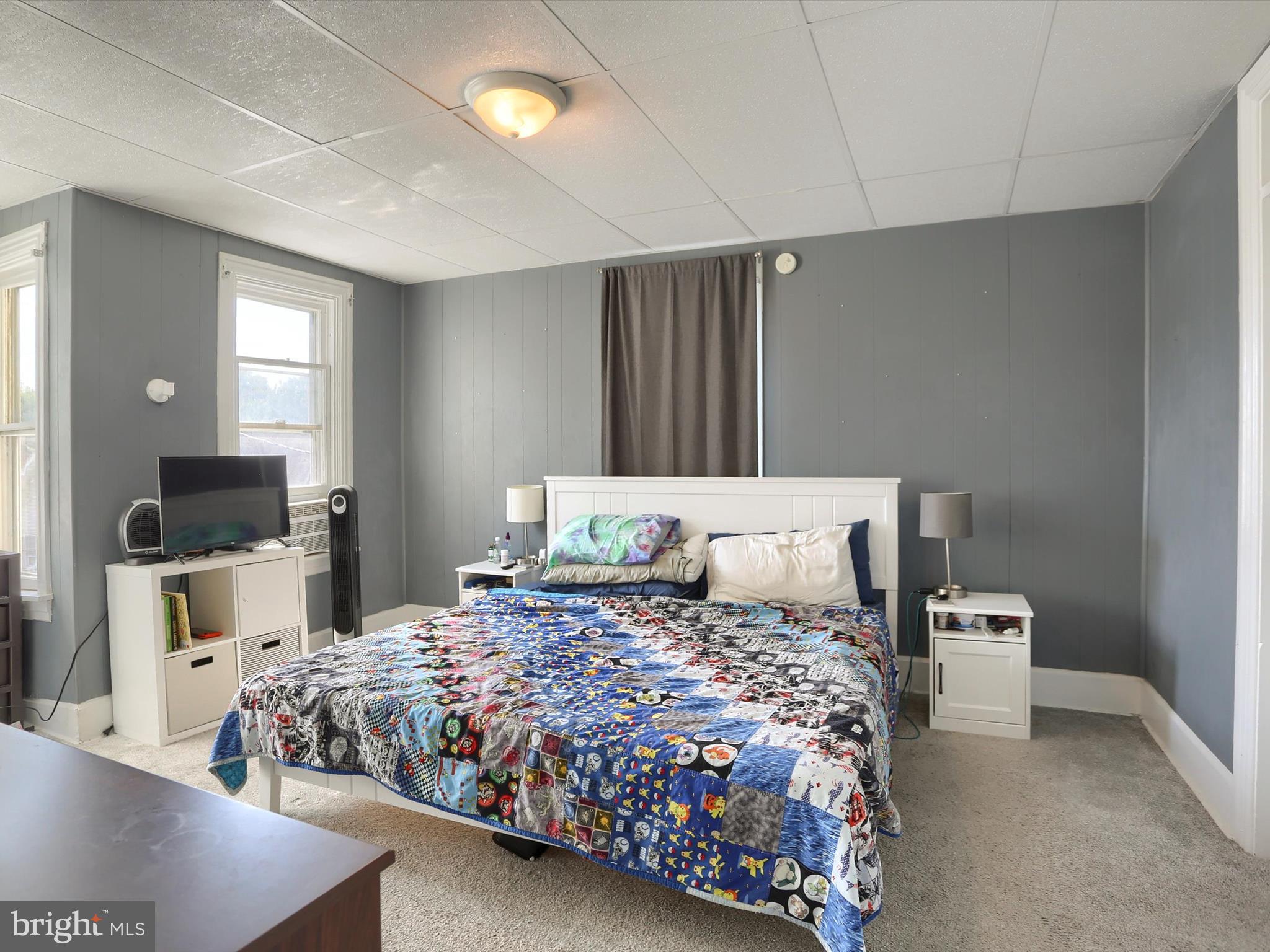 241 Pine Street Steelton, PA 17113 - Photo 23 of 32 a bedroom with a bed and a couch