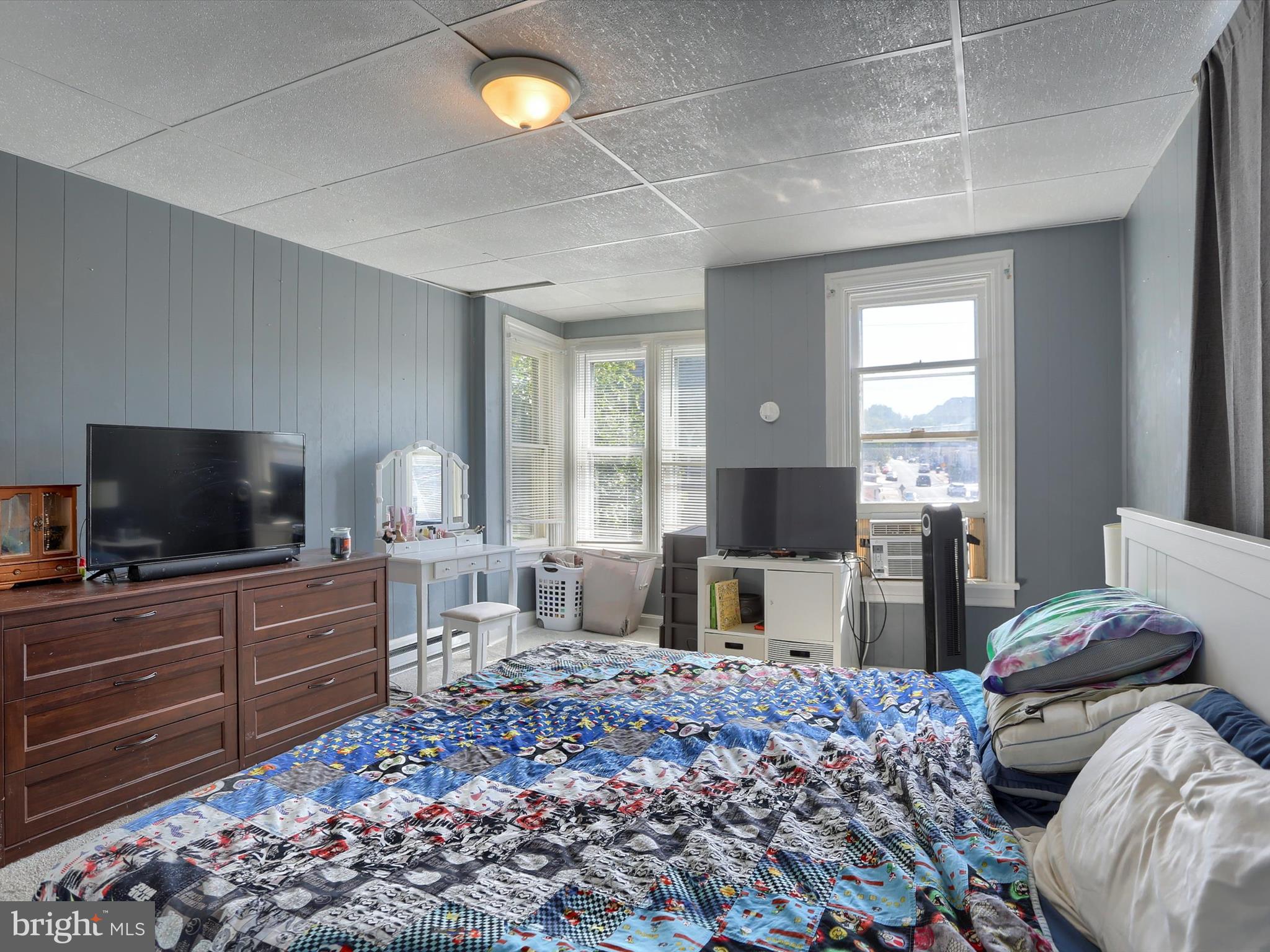 241 Pine Street Steelton, PA 17113 - Photo 24 of 32 a living room with furniture and a flat screen tv