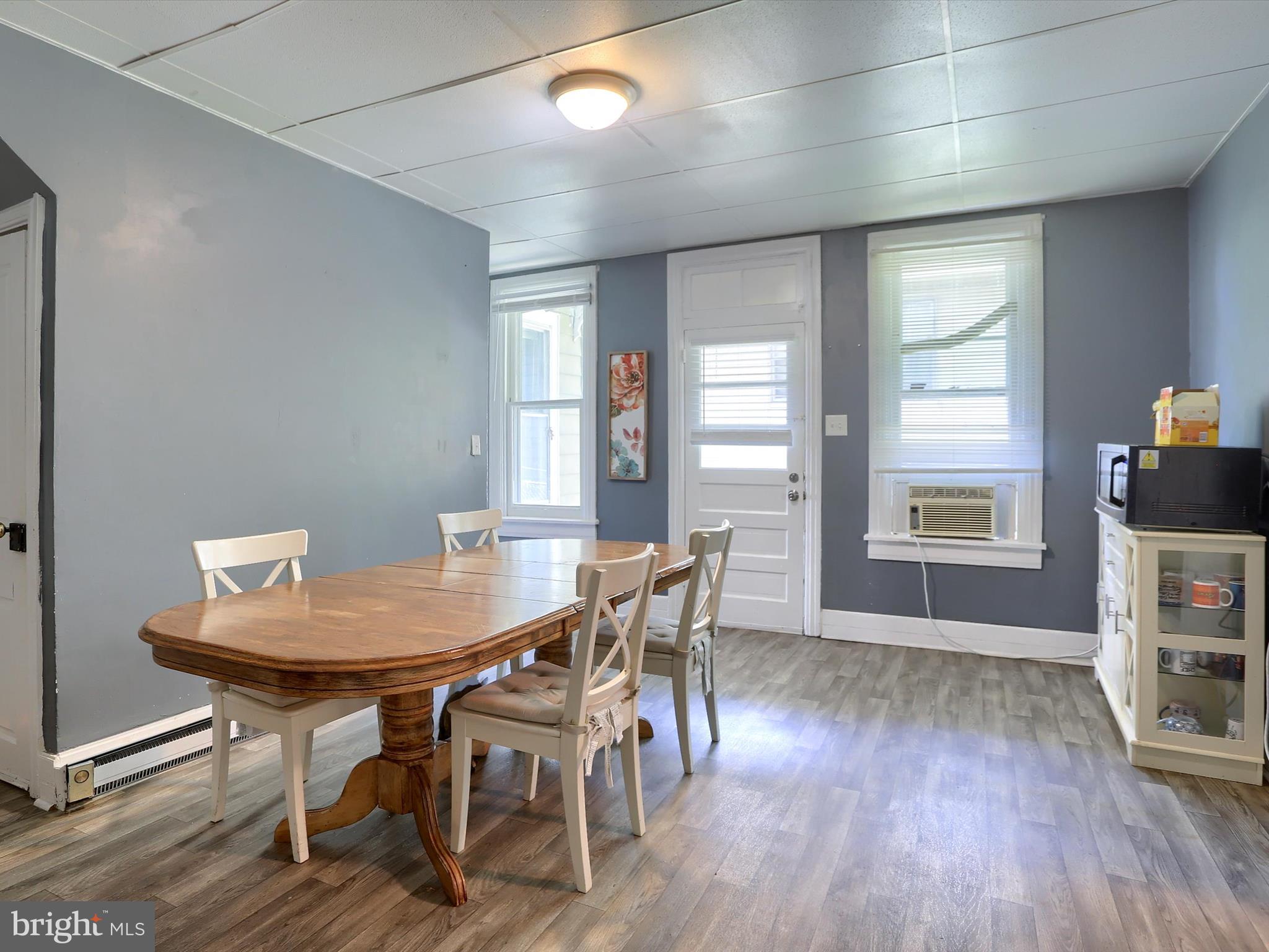 241 Pine Street Steelton, PA 17113 - Photo 10 of 32 a view of a dining room with furniture and wooden floor