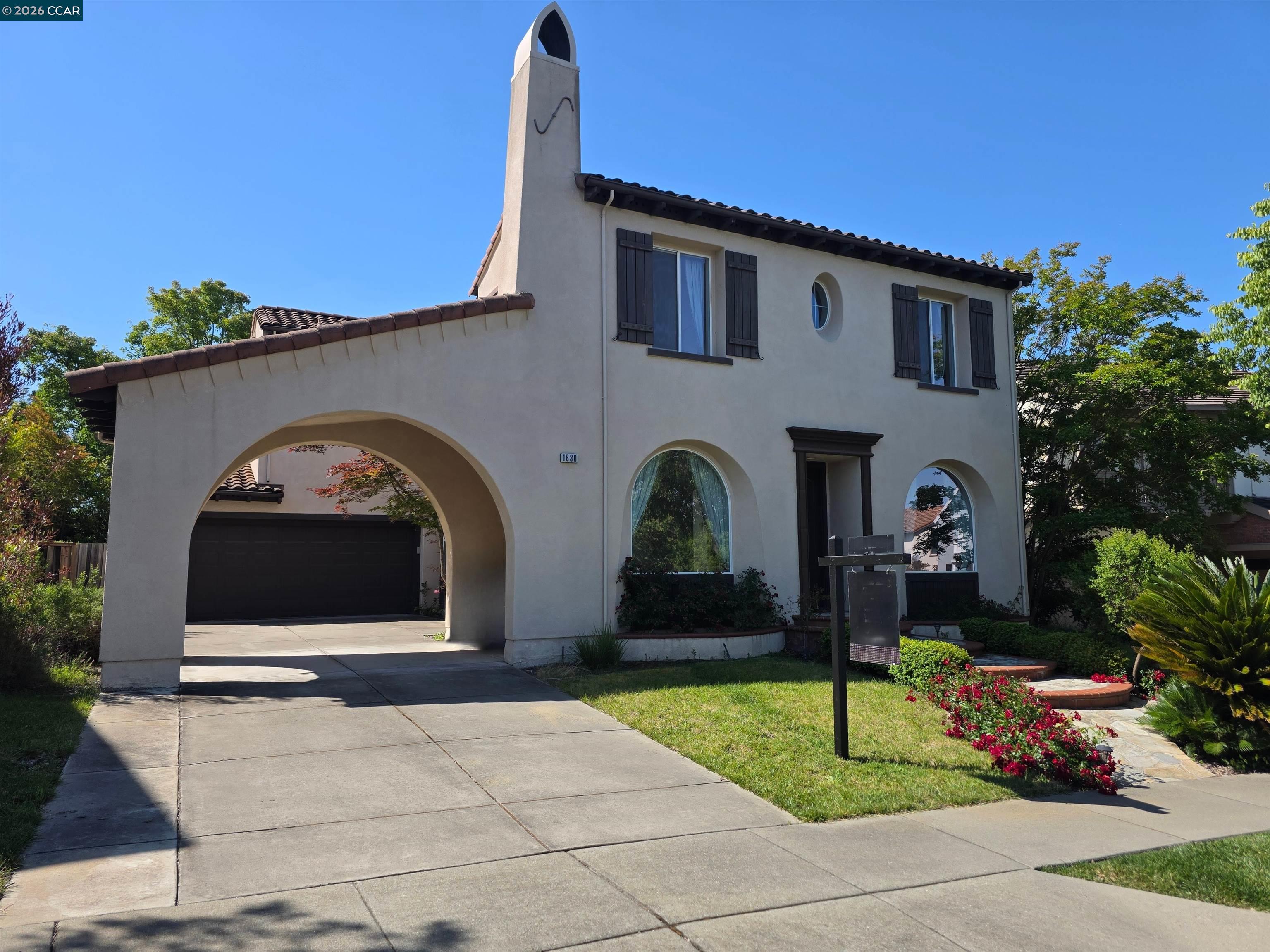 1830 Hollyview Drive San Ramon, CA 94582 - Photo 1 of 36 a front view of a house with garden