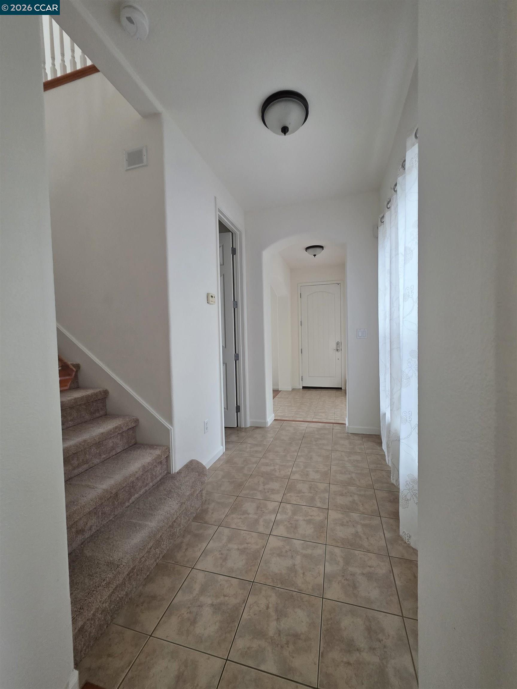 1830 Hollyview Drive San Ramon, CA 94582 - Photo 14 of 36 a view of a hallway with staircase