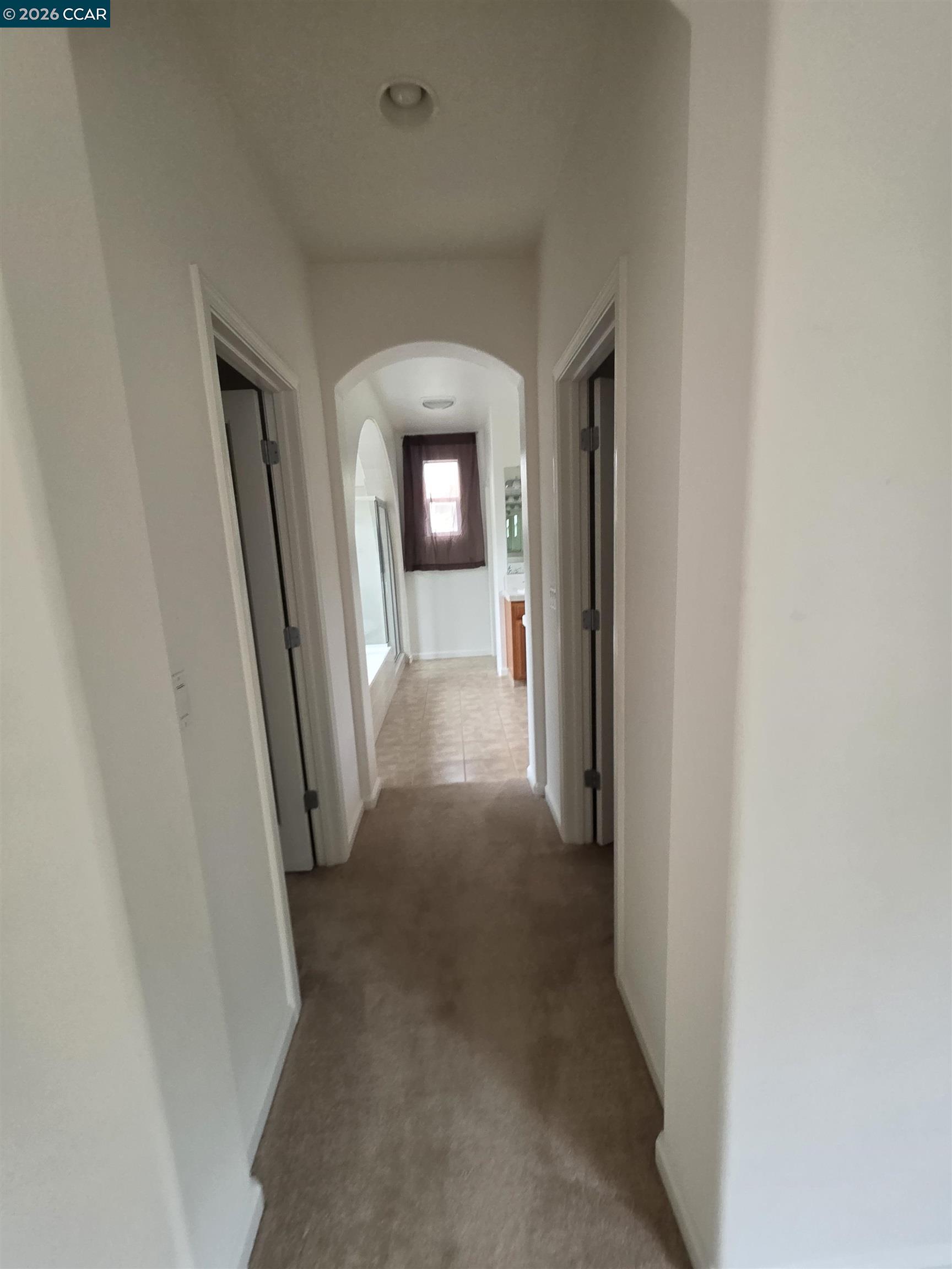 1830 Hollyview Drive San Ramon, CA 94582 - Photo 18 of 36 a view of a hallway with wooden floor