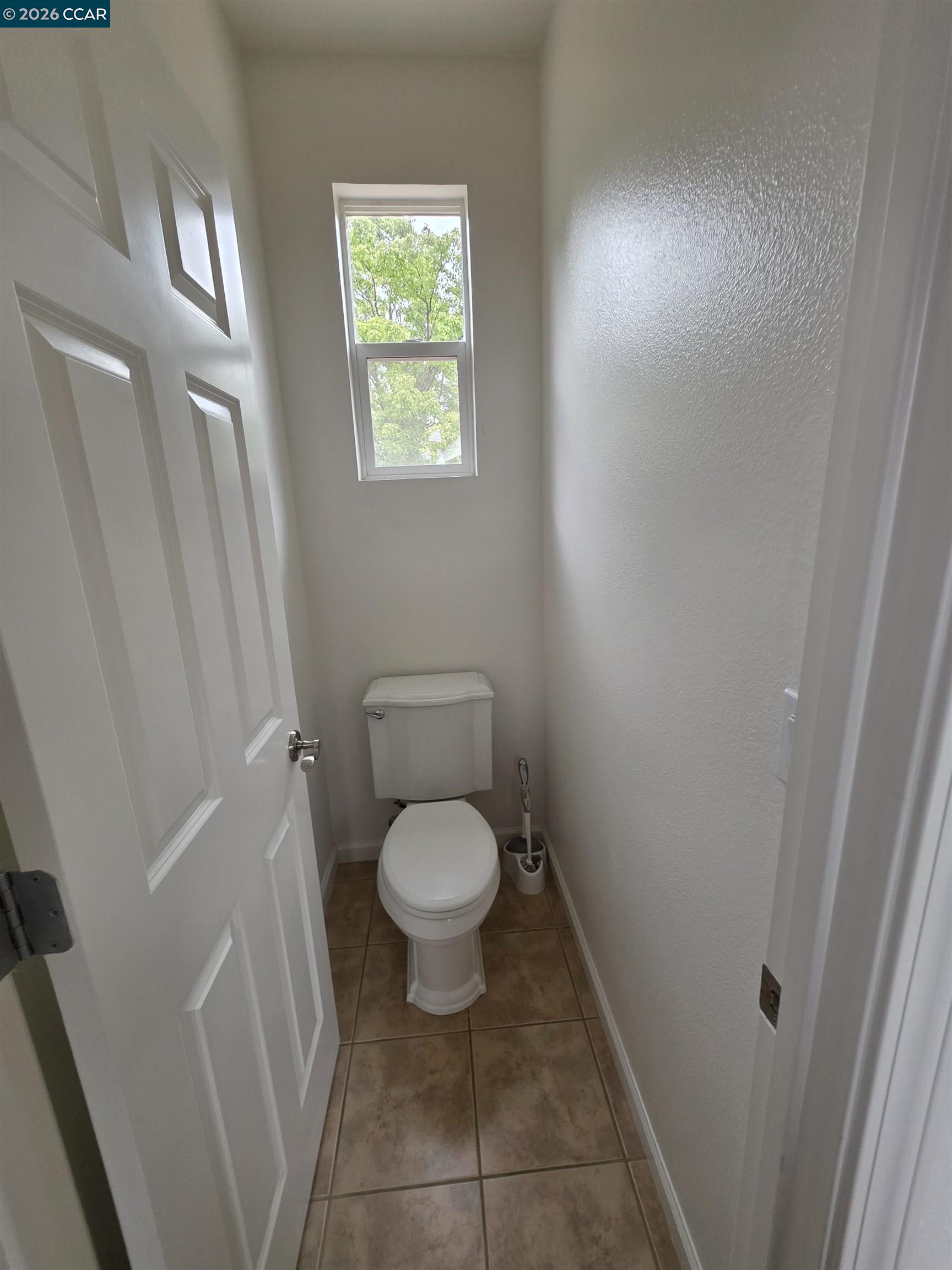 1830 Hollyview Drive San Ramon, CA 94582 - Photo 24 of 36 a bathroom with a toilet and a shower
