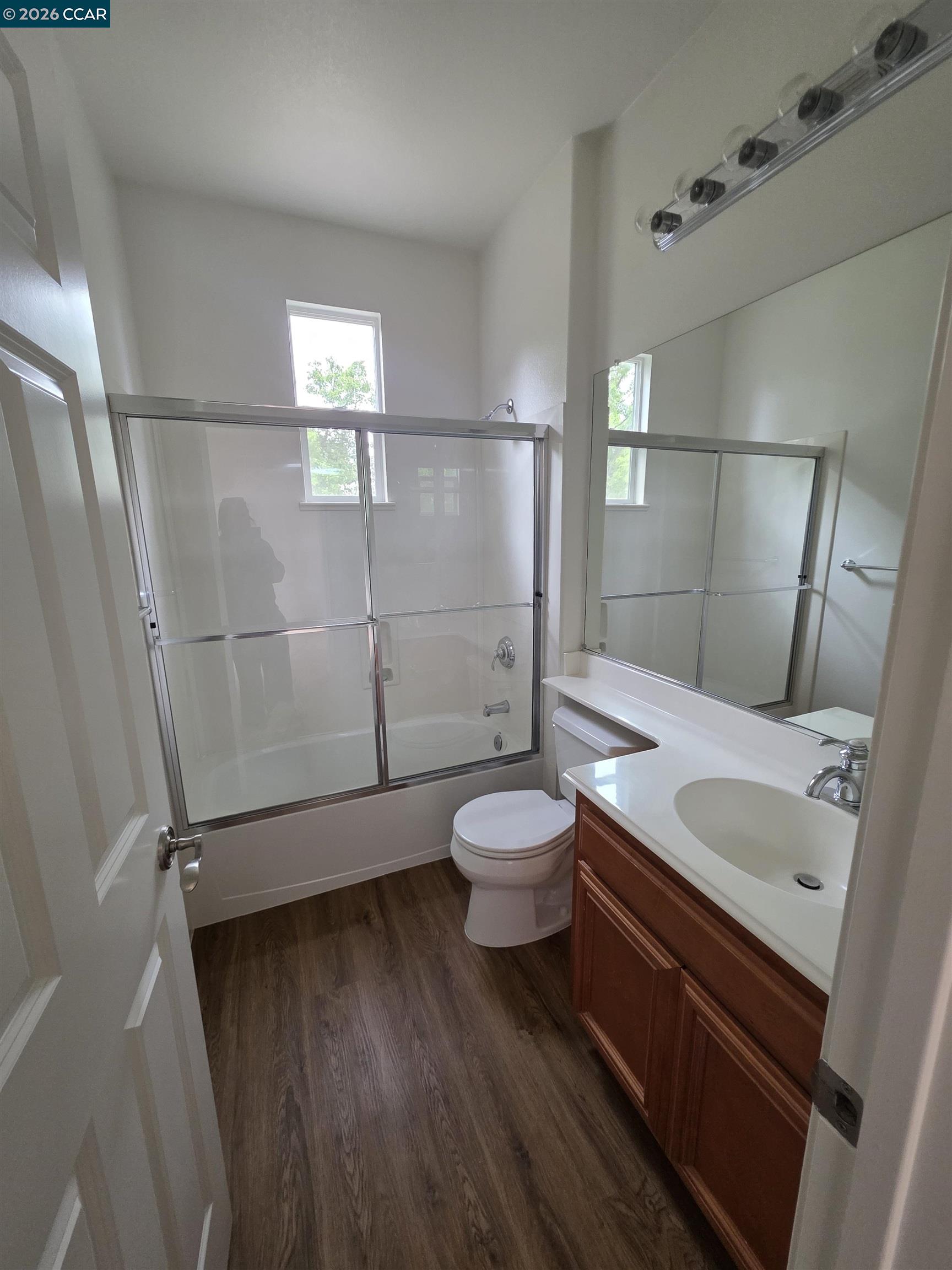1830 Hollyview Drive San Ramon, CA 94582 - Photo 28 of 36 a bathroom with a granite countertop sink toilet and shower
