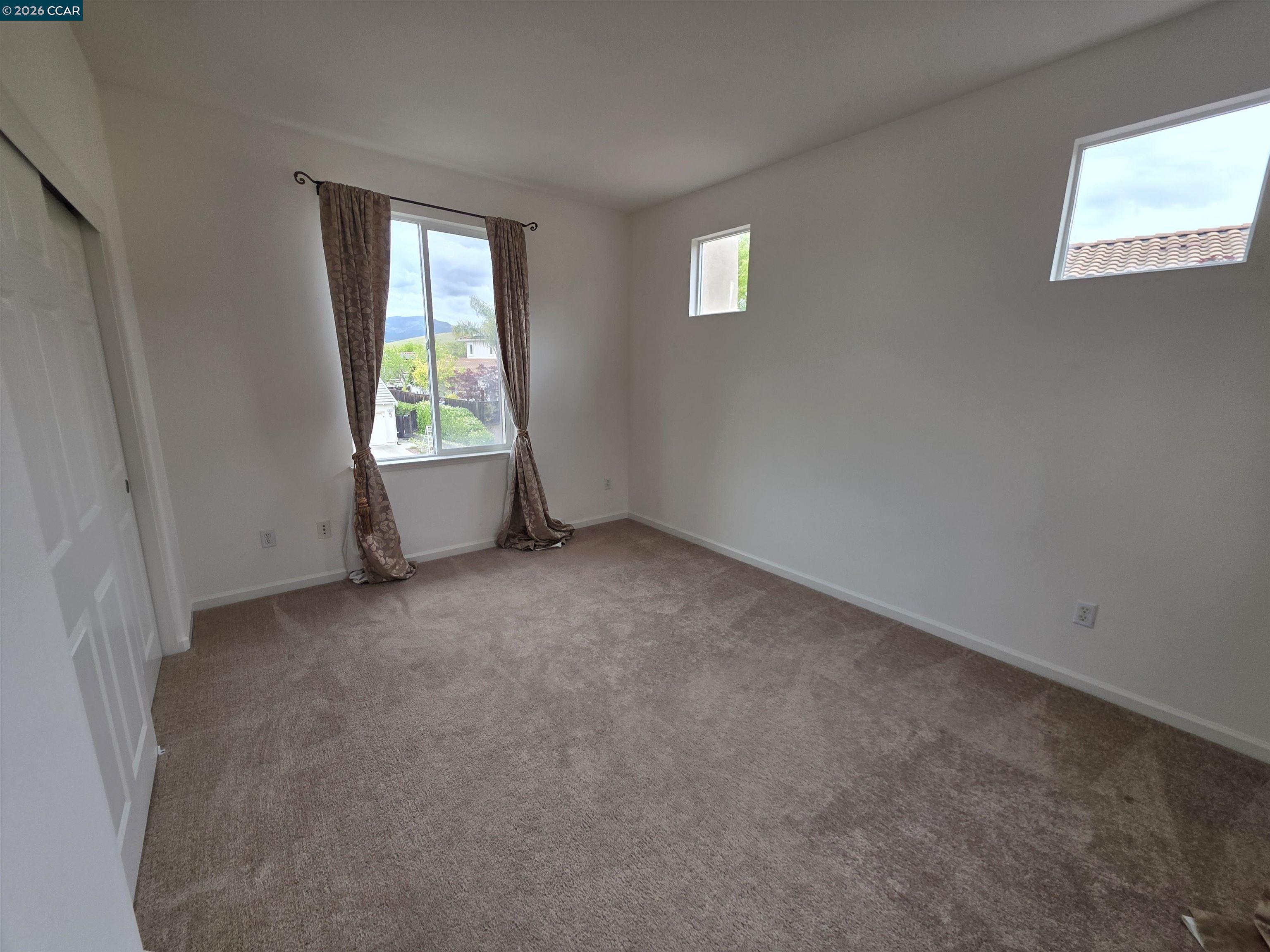 1830 Hollyview Drive San Ramon, CA 94582 - Photo 30 of 36 an empty room with a window