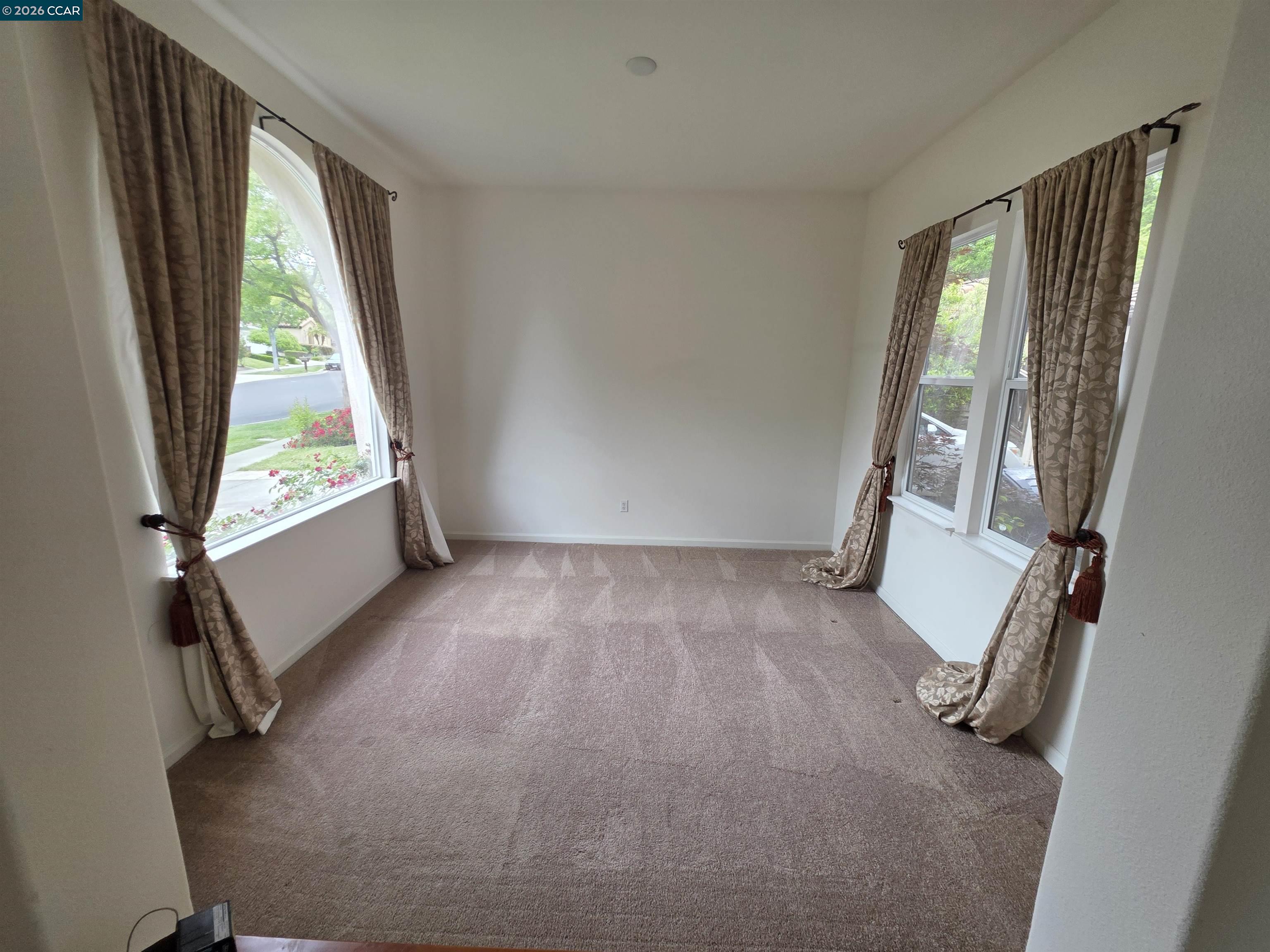 1830 Hollyview Drive San Ramon, CA 94582 - Photo 3 of 36 a view of an empty room with a window
