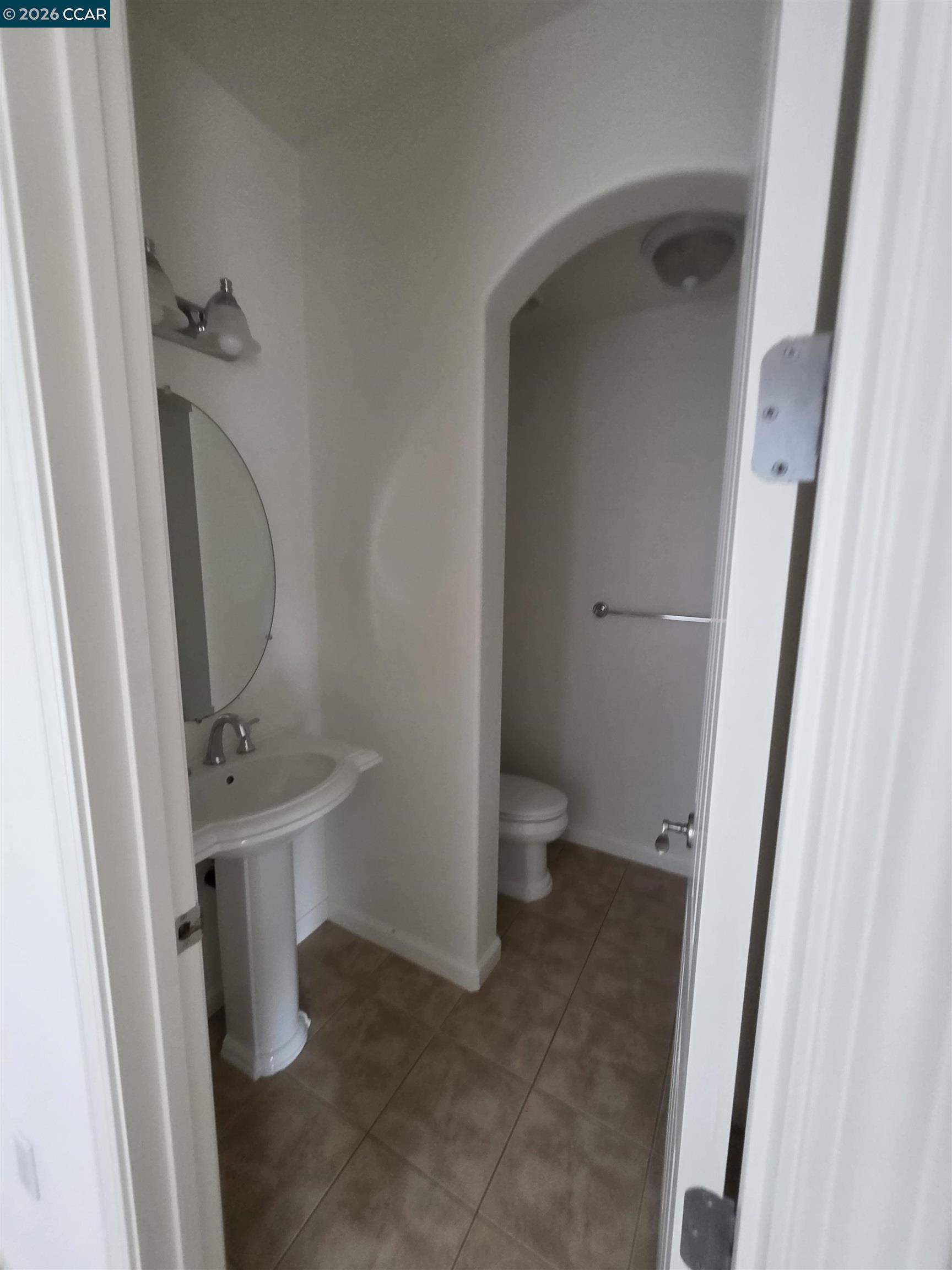 1830 Hollyview Drive San Ramon, CA 94582 - Photo 4 of 36 a bathroom with a sink and toilet