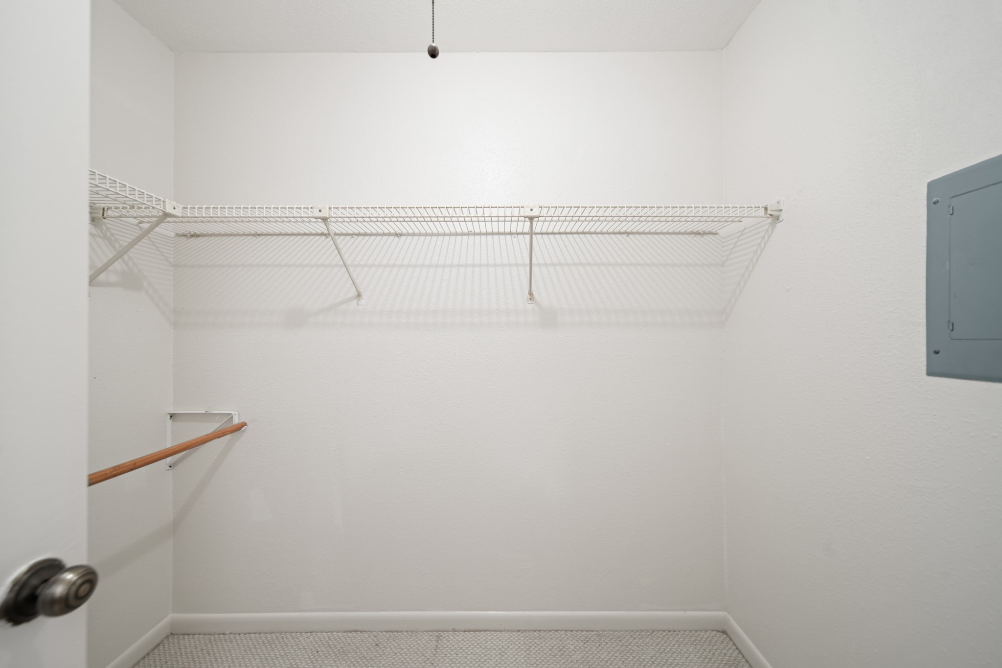 8100 Cambridge Street, Unit 6 Houston, TX 77054 - Photo 17 of 23 a view of a room with racks on the wall