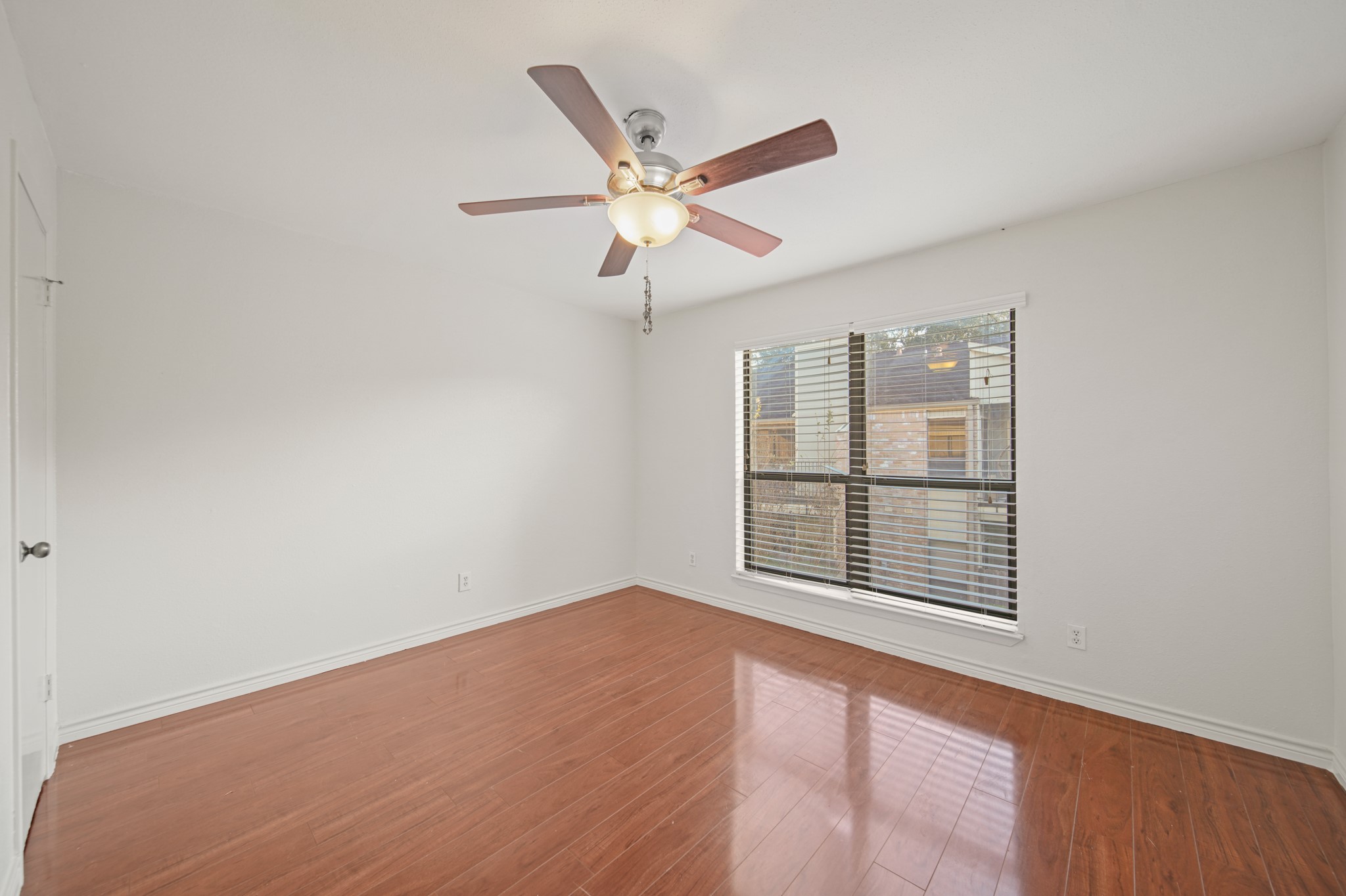 8100 Cambridge Street, Unit 6 Houston, TX 77054 - Photo 18 of 23 a view of an empty room with a window