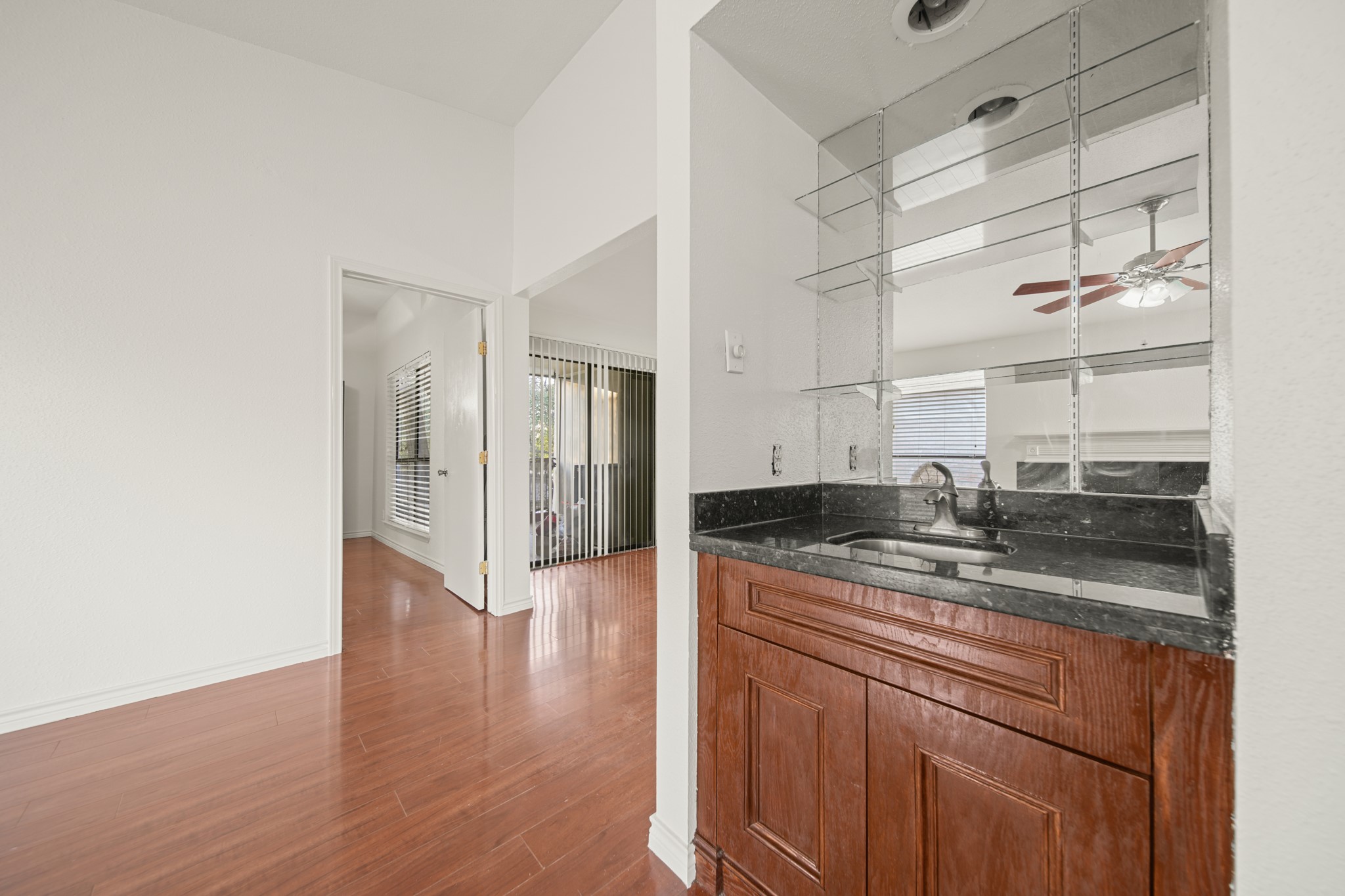 8100 Cambridge Street, Unit 6 Houston, TX 77054 - Photo 8 of 23 a kitchen with a sink and cabinets