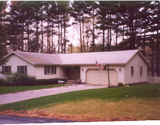 9 Cathy Road Chelmsford, MA 01824 - Photo 1 of 1 a front view of house with yard and green space