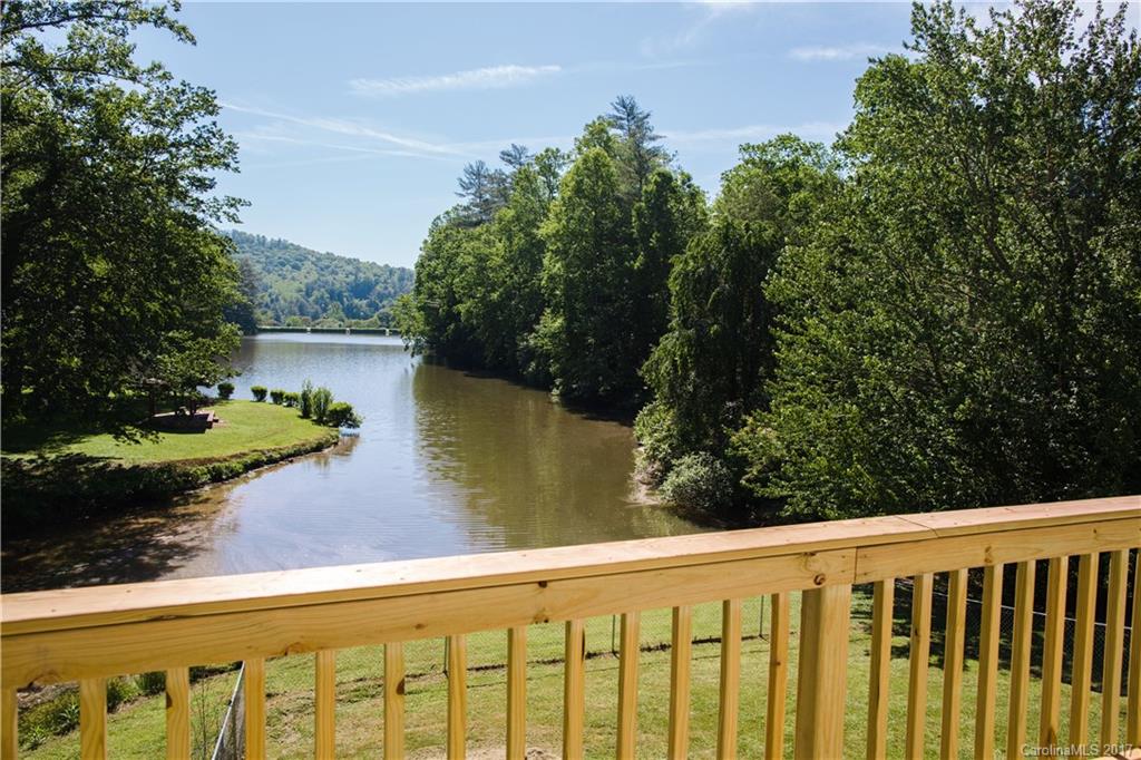 206 Brandon Road Hendersonville, NC 28739 - Photo 3 of 16 a view of a lake from a balcony