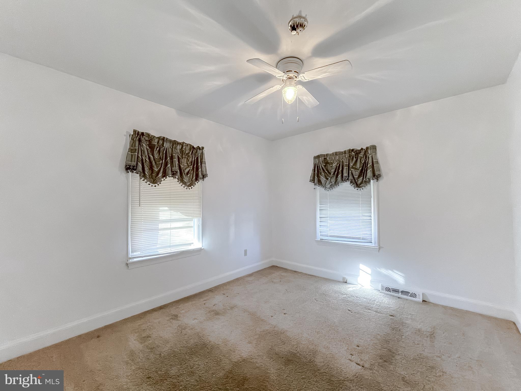 1 Prospect Avenue Indian Head, MD 20640 - Photo 16 of 44 an empty room with windows and fan