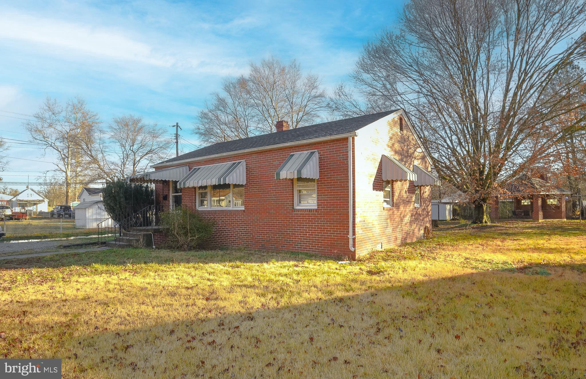 1 Prospect Avenue Indian Head, MD 20640 - Photo 3 of 44 a view of the house with a yard covered with snow