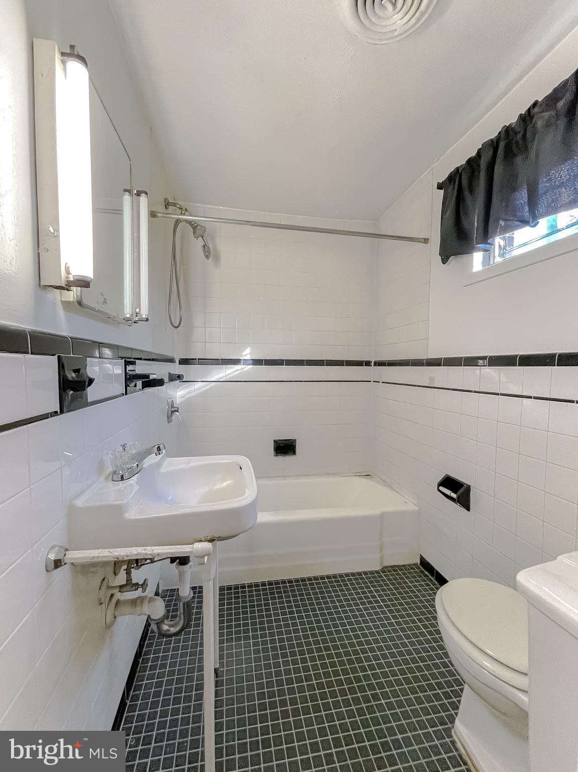 1 Prospect Avenue Indian Head, MD 20640 - Photo 41 of 44 a bathroom with a sink a toilet and a mirror