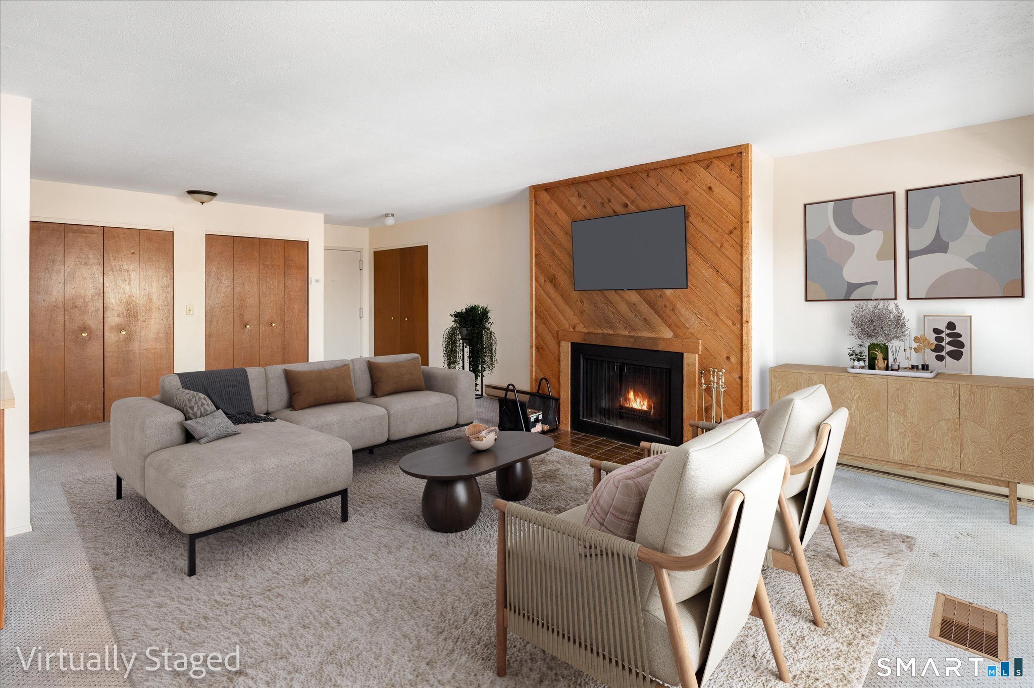 950 Cove Road, Unit B6 Stamford, CT 06902 - Photo 11 of 34 a living room with furniture and a fireplace