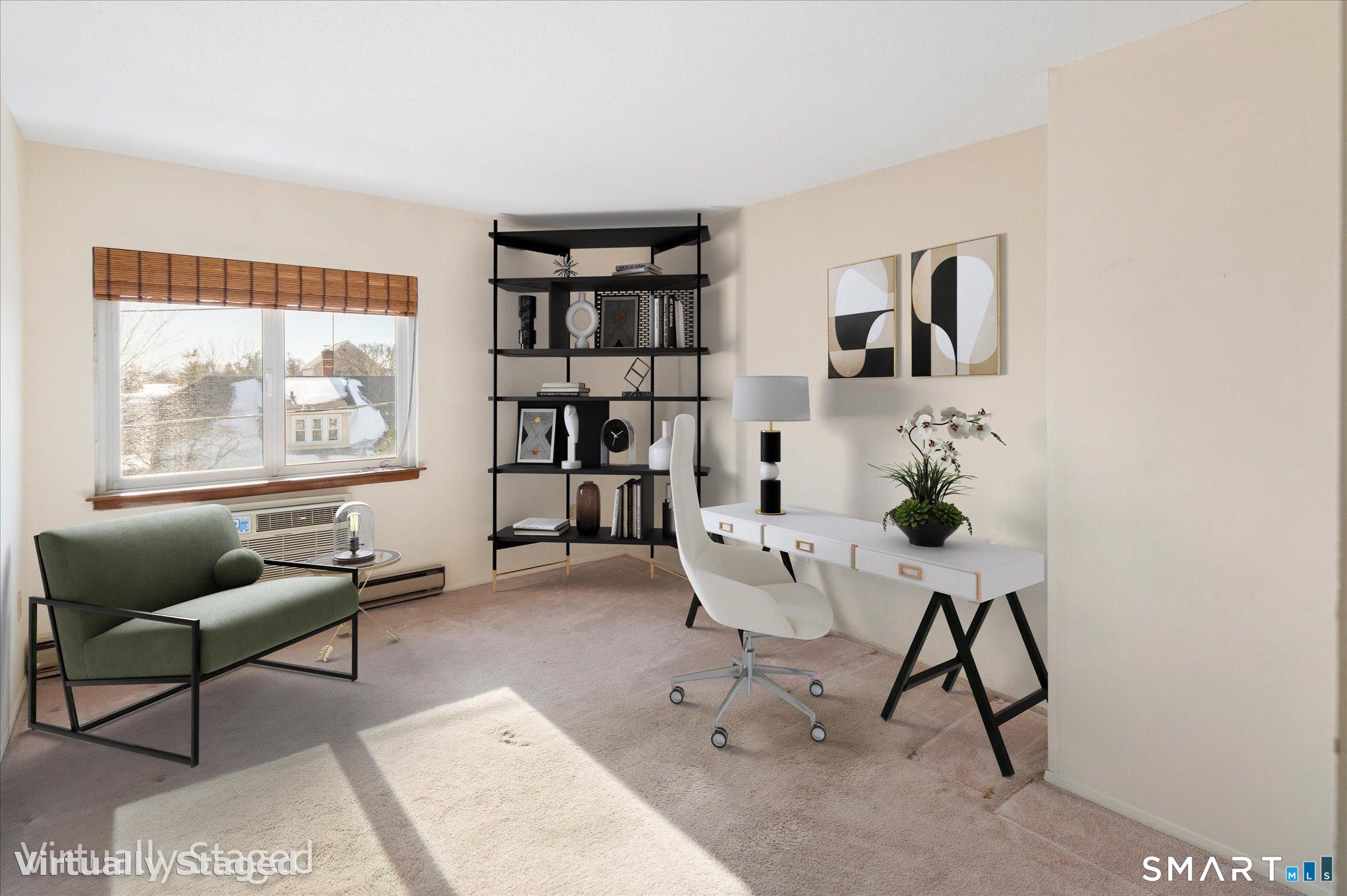 950 Cove Road, Unit B6 Stamford, CT 06902 - Photo 32 of 34 a work room with furniture and a window