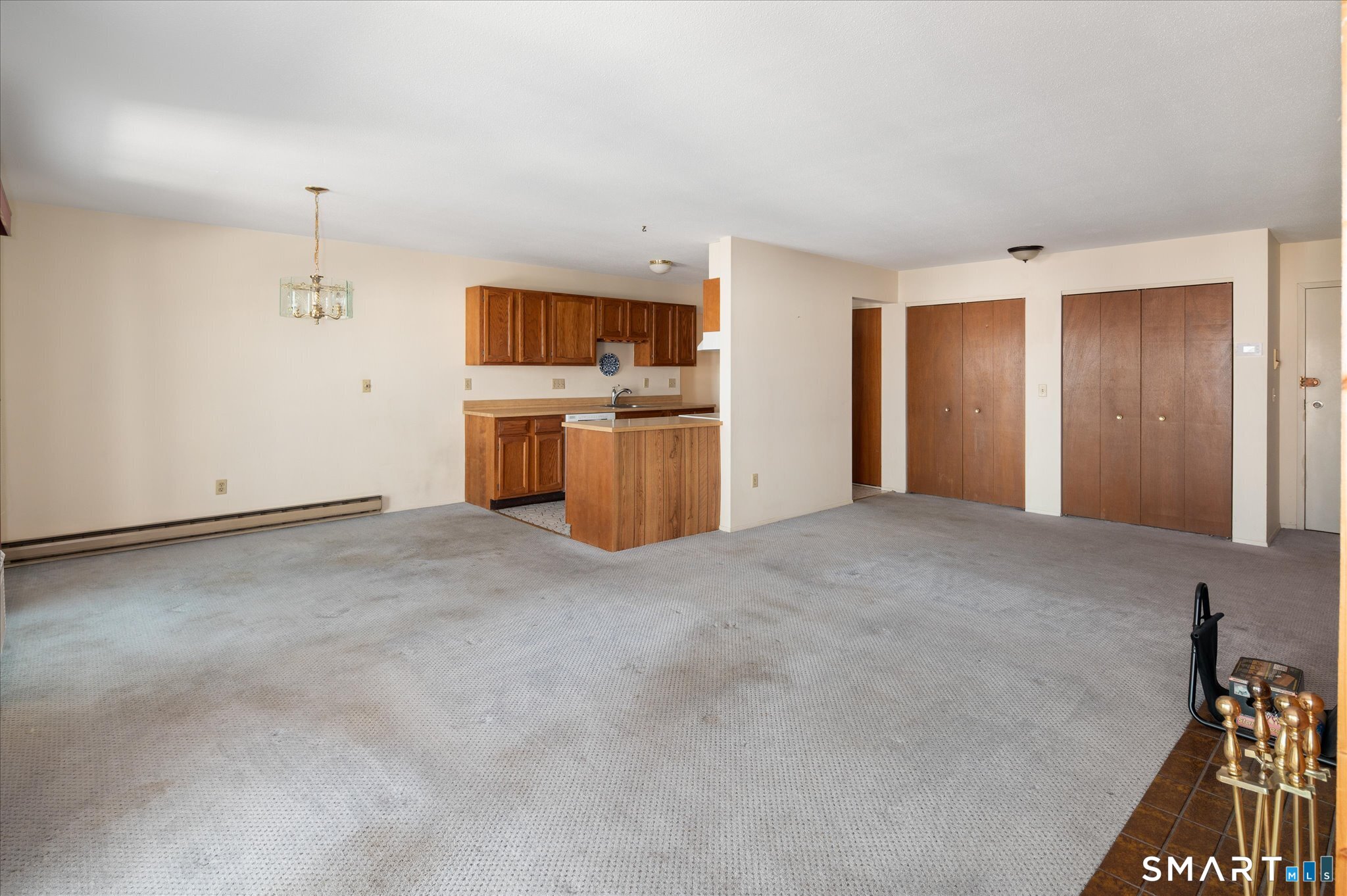 950 Cove Road, Unit B6 Stamford, CT 06902 - Photo 6 of 34 a view of a kitchen with a sink and dishwasher a kitchen view