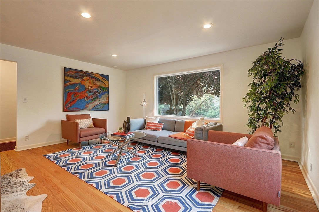 4606 South Adams Street Seattle, WA 98118 - Photo 11 of 29 a living room with furniture and a large window