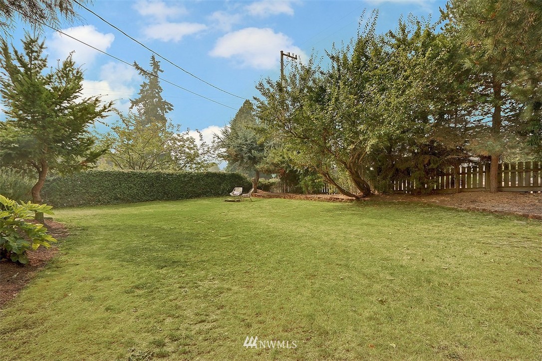 4606 South Adams Street Seattle, WA 98118 - Photo 28 of 29 a view of outdoor space with garden and trees