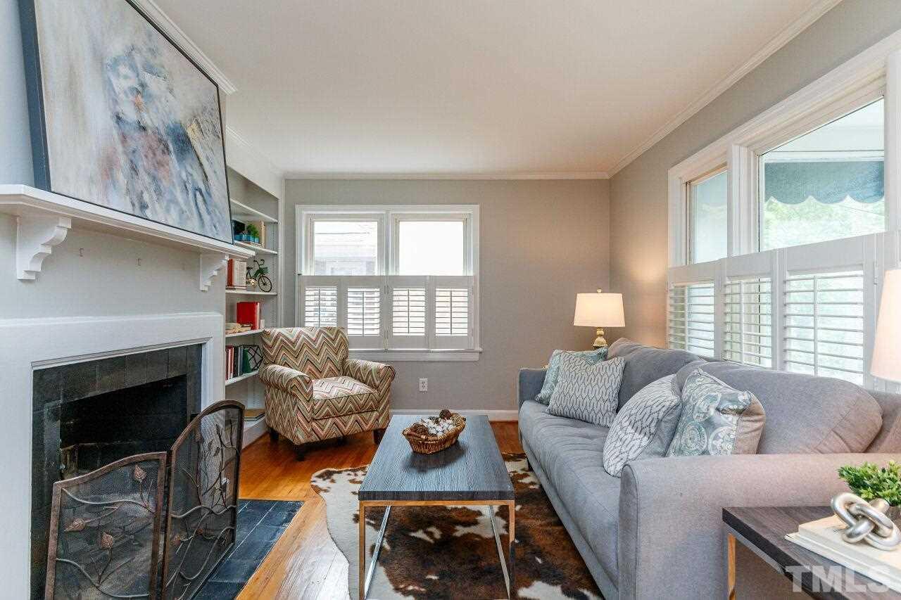 3018 Medlin Drive Raleigh, NC 27607 - Photo 7 of 30 Filled with windows, this family room is nice and bright. Great light throughout the home