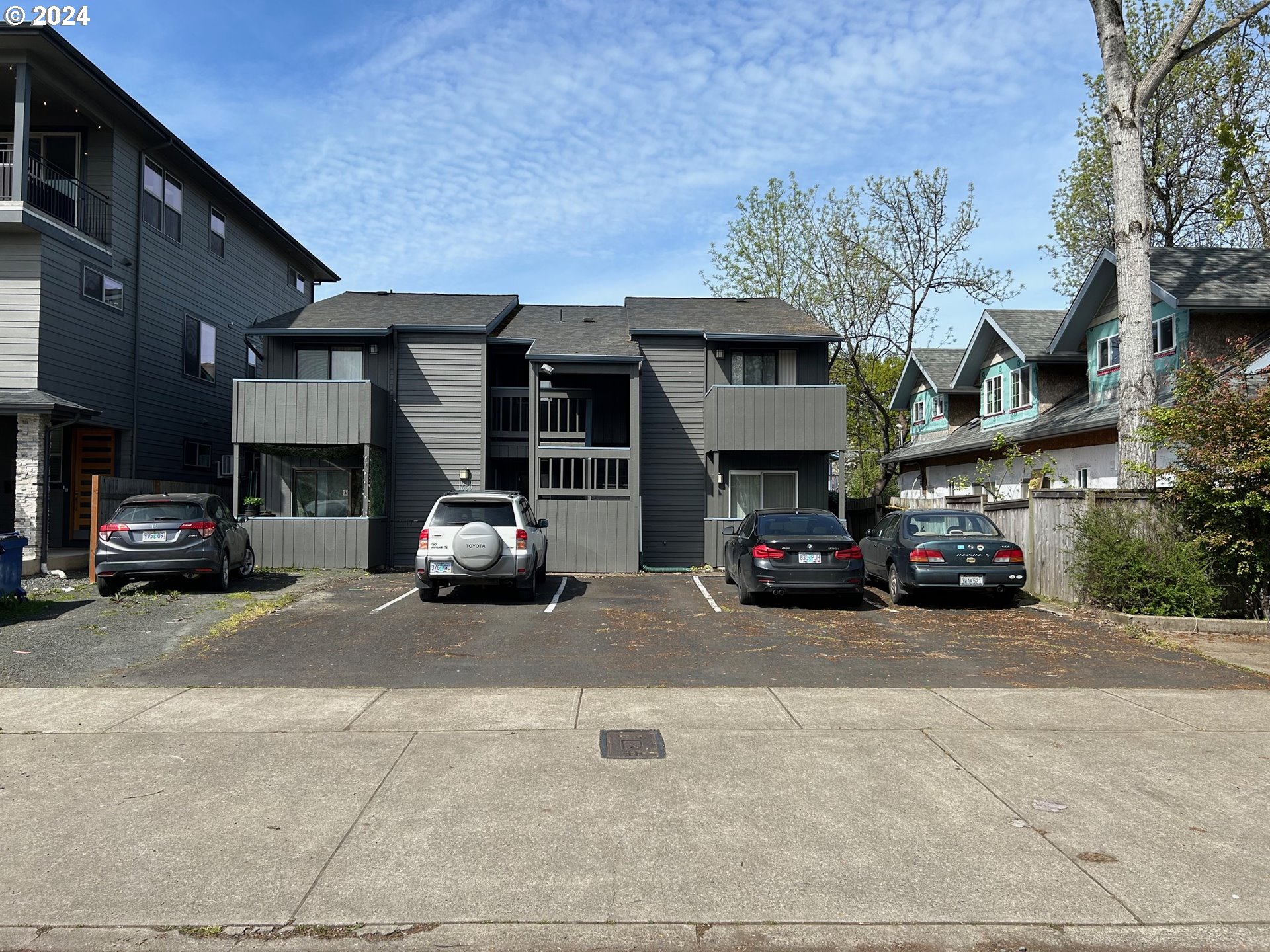 1640 Mill Street Eugene, OR 97401 - Photo 1 of 12 a car parked in front of a building