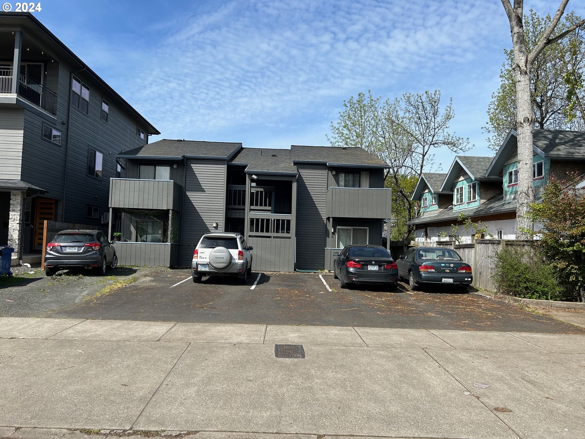 1640 Mill Street Eugene, OR 97401 - Photo 2 of 12 a car parked in front of a building
