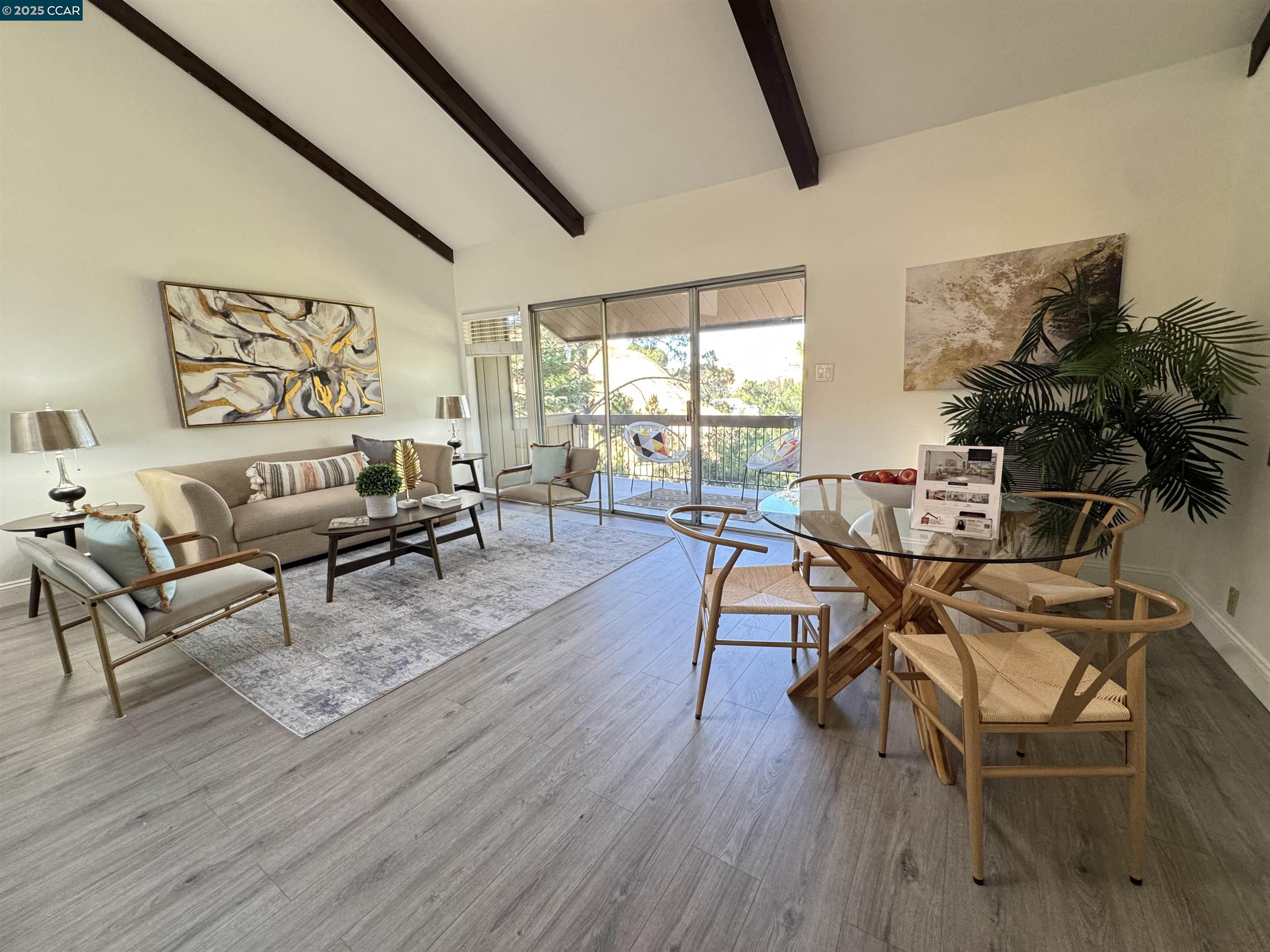2075 Ascot Drive, Unit 221 Moraga, CA 94556 - Photo 2 of 21 a living room with furniture and wooden floor