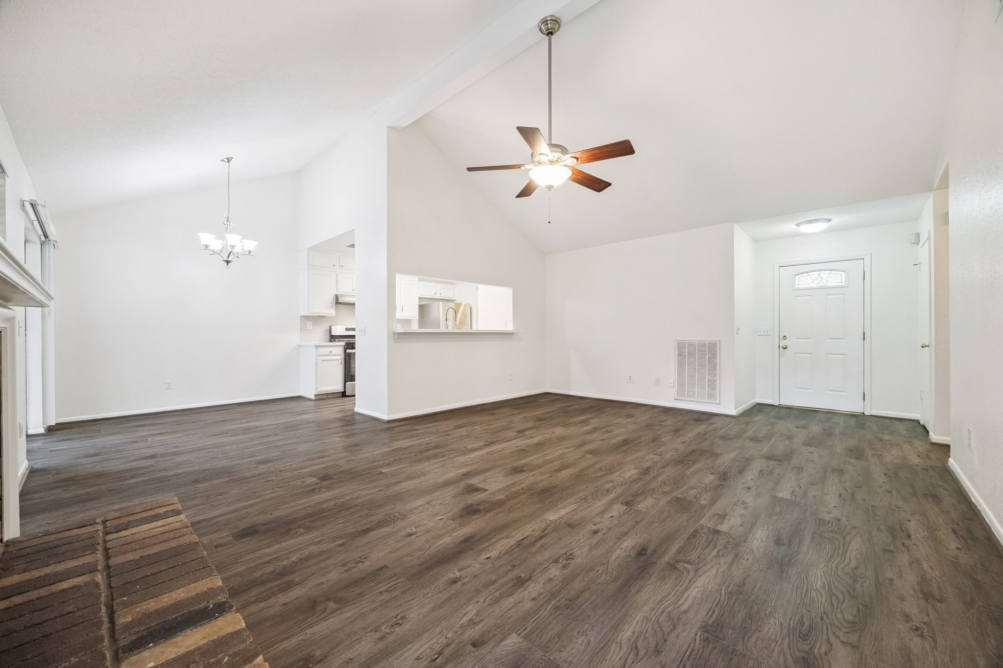 3923 Windmill Street Sugar Land, TX 77479 - Photo 4 of 16 a view of empty room with wooden floor and ceiling fan