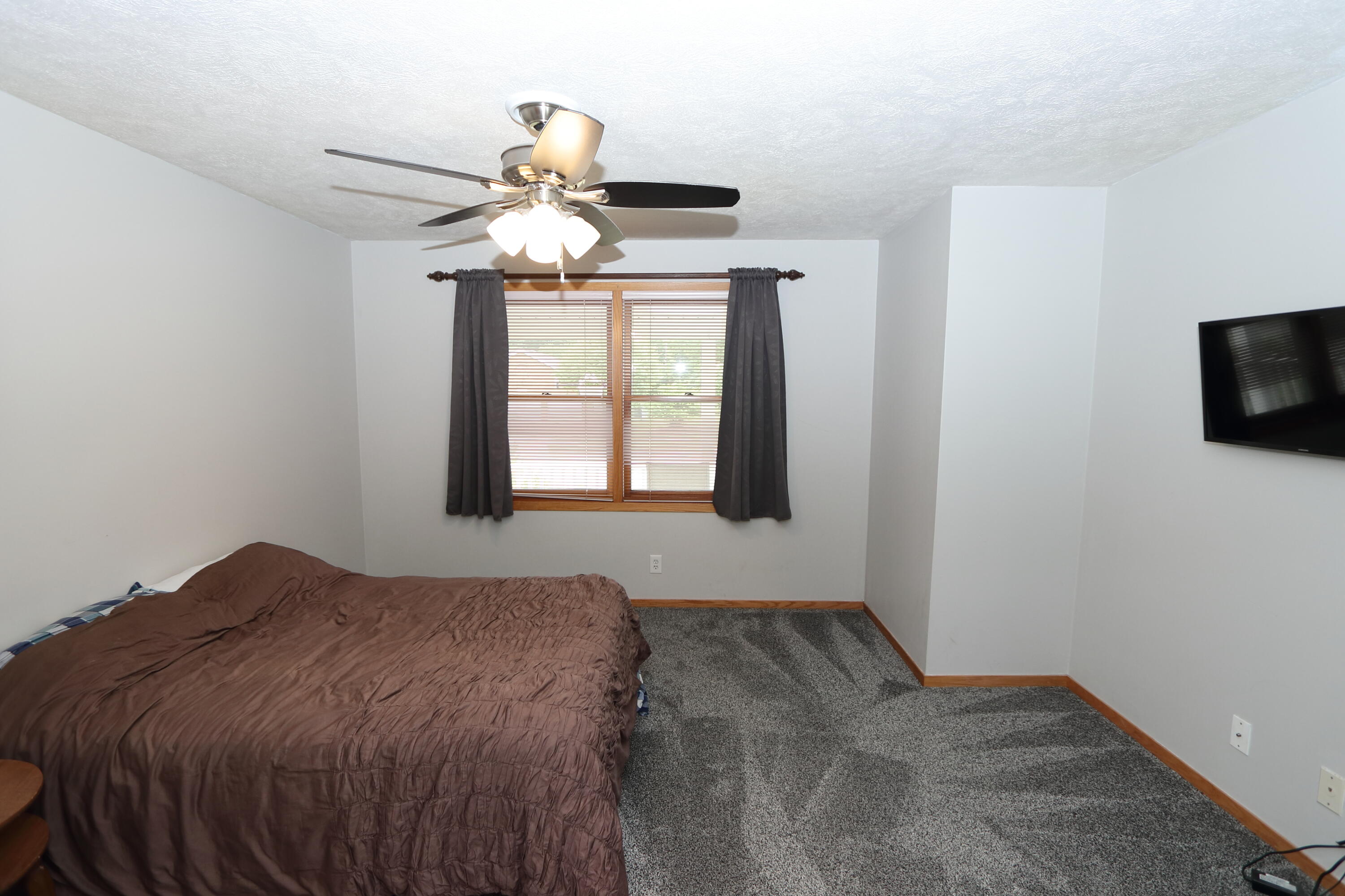 8605 Ridgebluff Drive Southwest Byron Center, MI 49315 - Photo 8 of 26 Primary Bedroom