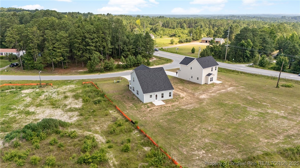 29 Red Bird Drive Cameron, NC 28326 - Photo 3 of 22 a view of a swimming pool with a patio