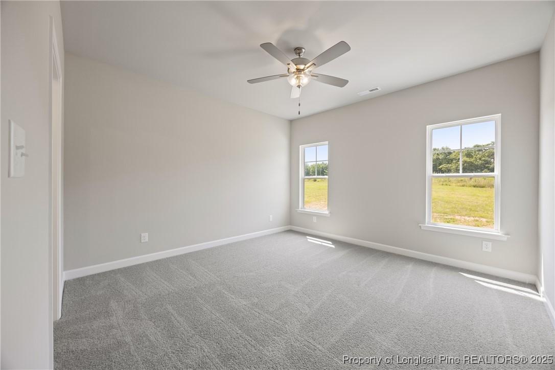 29 Red Bird Drive Cameron, NC 28326 - Photo 10 of 22 a view of an empty room with a window