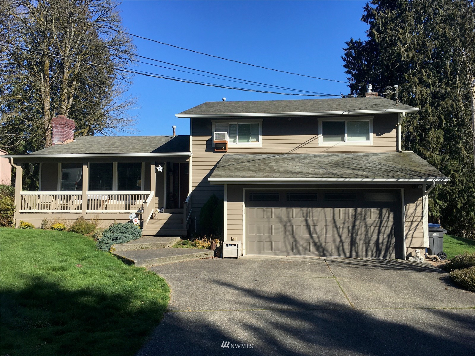 14515 Connelly Road Snohomish, WA 98296 - Photo 1 of 1 a front view of a house with a yard