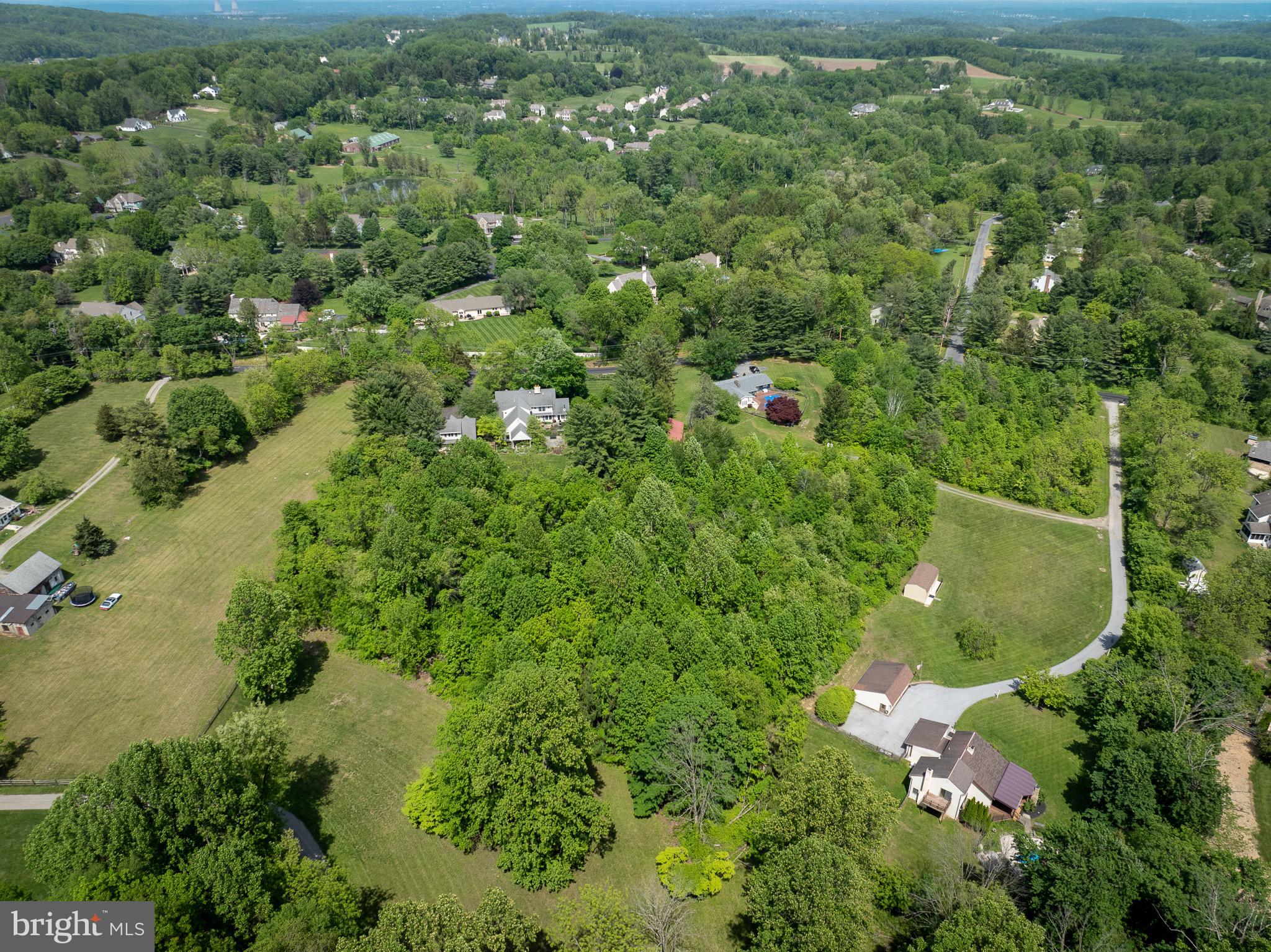 2290 Horseshoe Trail Chester Springs, PA 19425 - Photo 2 of 6 an aerial view of residential houses with outdoor space and trees